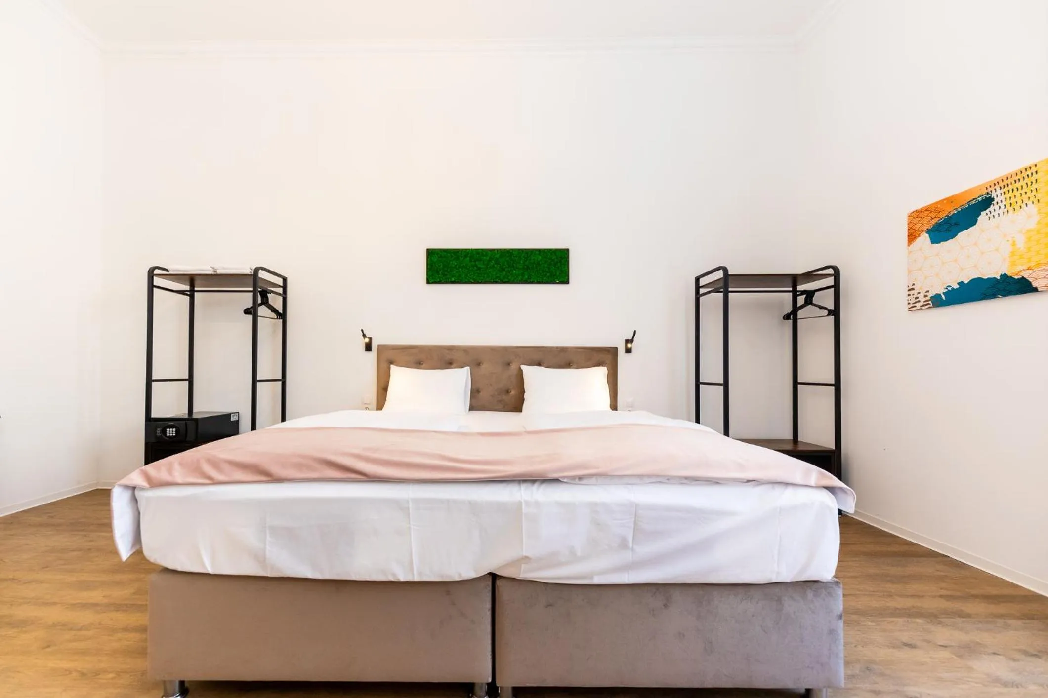 Bed in Adagio Downtown Rooms