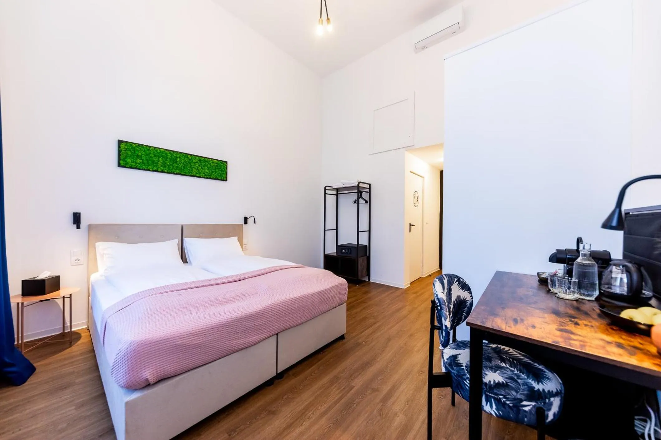 Bed in Adagio Downtown Rooms