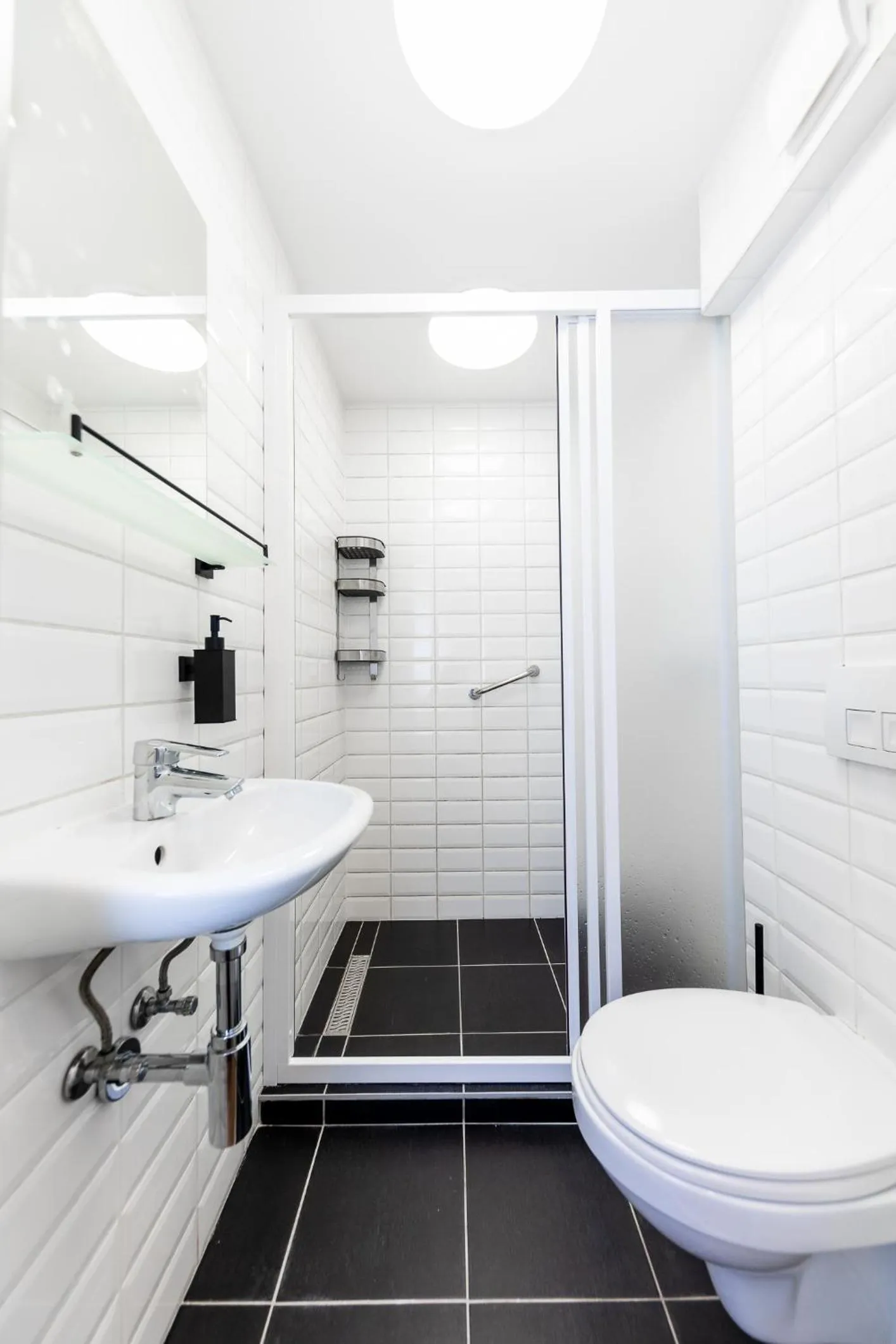 Toilet in Adagio Downtown Rooms