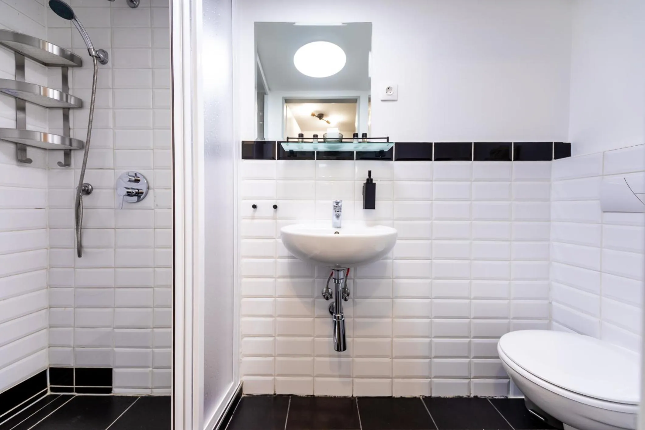 Bathroom in Adagio Downtown Rooms