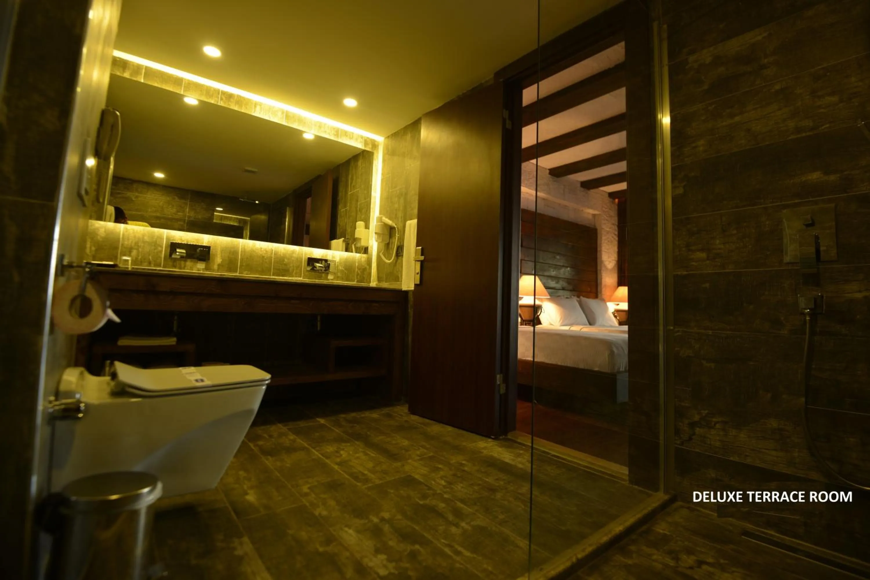 Toilet, Bed in Manaspark Deluxe Hotel