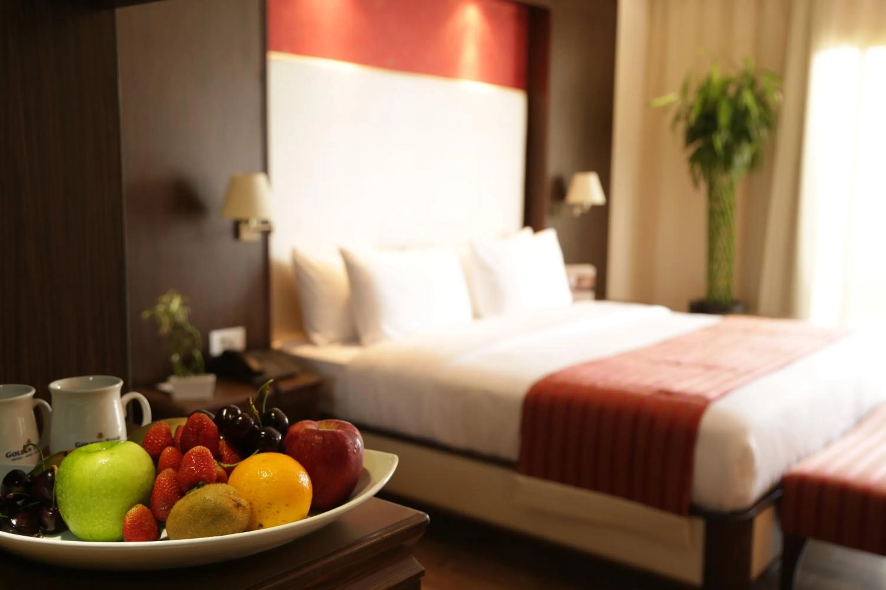 Bed in Golden Lili Resort & Spa