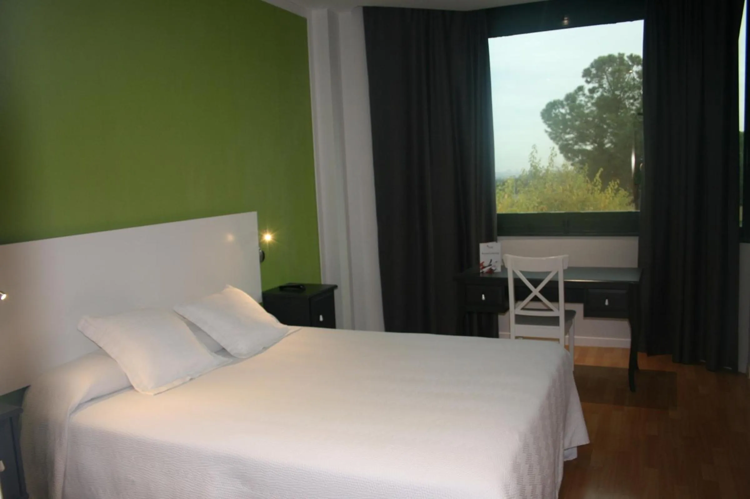 Bed in Apartamentos TH Las Rozas