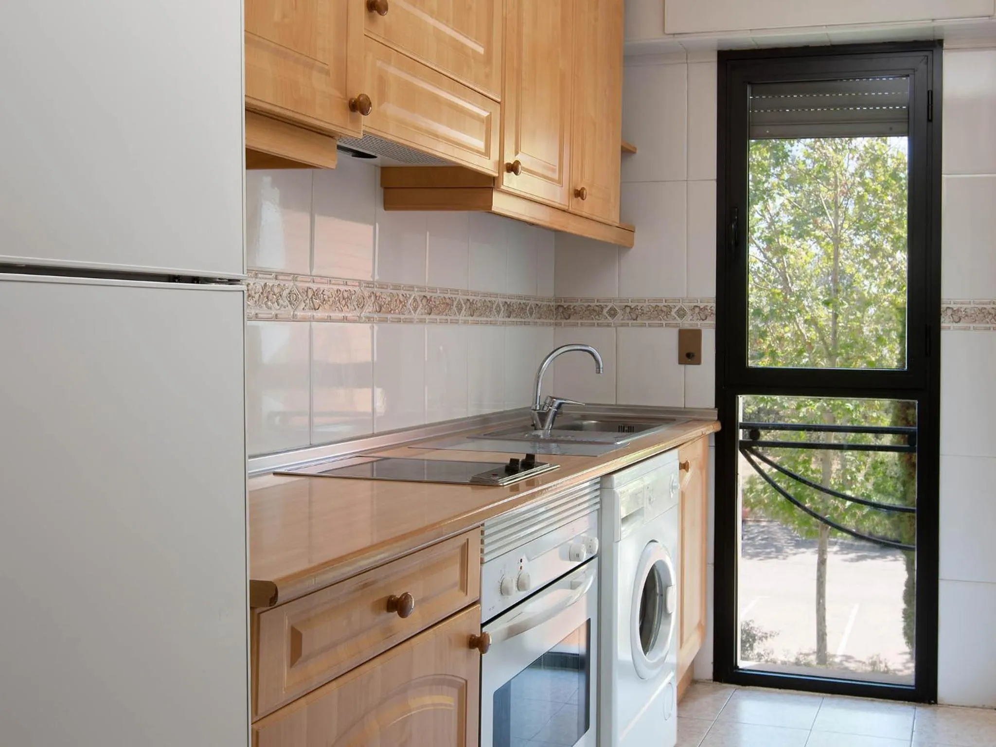 Kitchen or kitchenette in Apartamentos TH La Florida