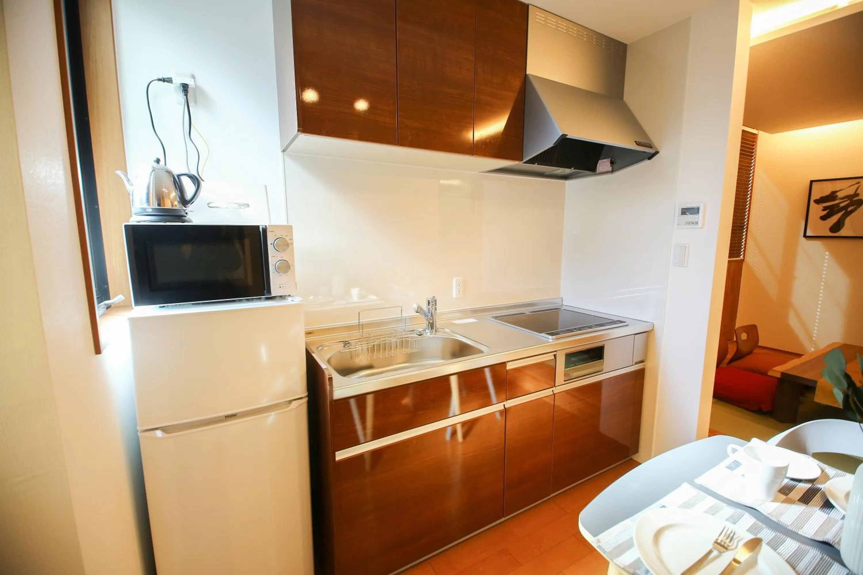 Kitchen or kitchenette, Bed in PrimeRoom別府 TATAMIsuite