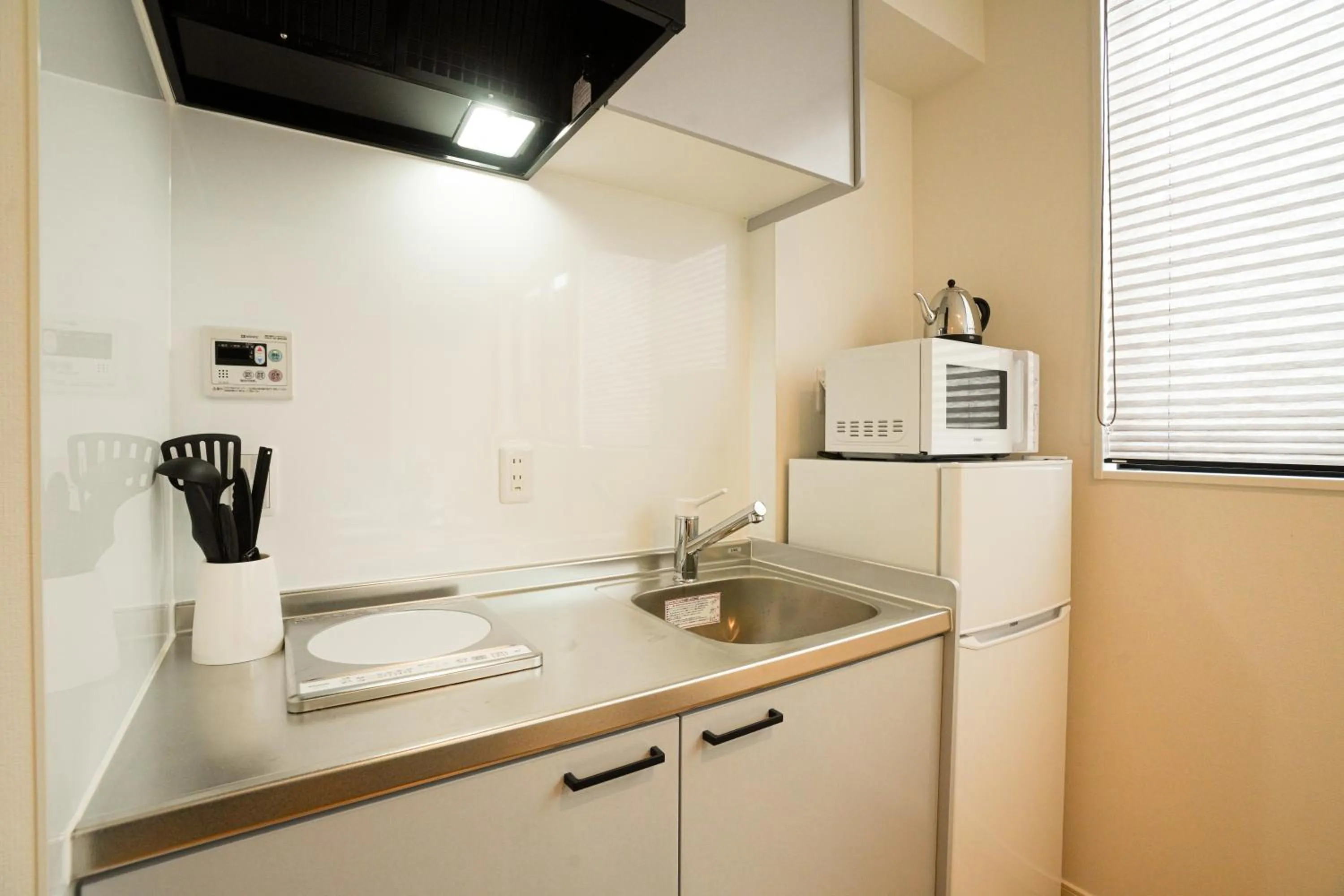 Kitchen or kitchenette in PrimeRoom別府 SAKURA