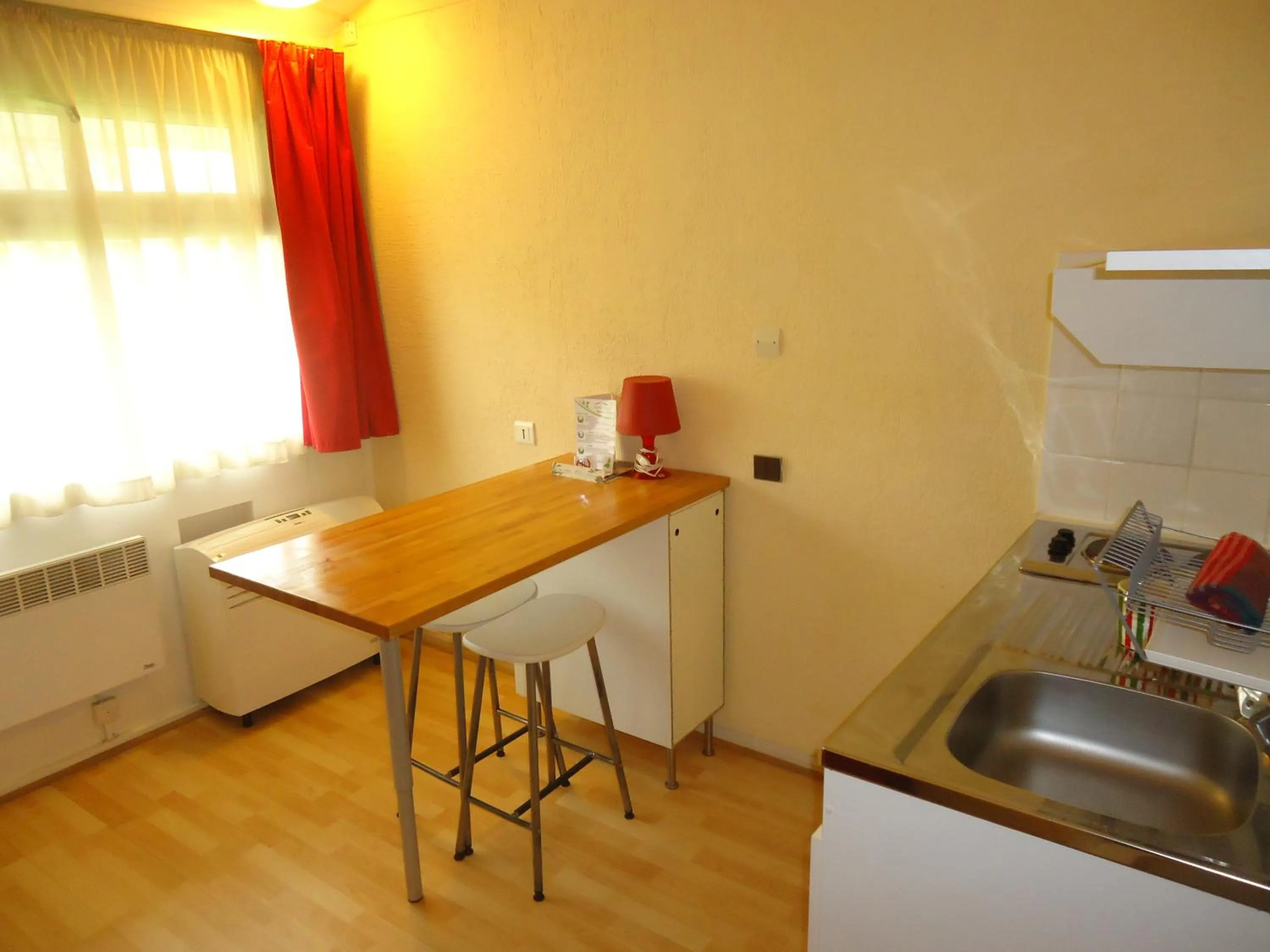 Kitchen or kitchenette in Résidence Thibaud