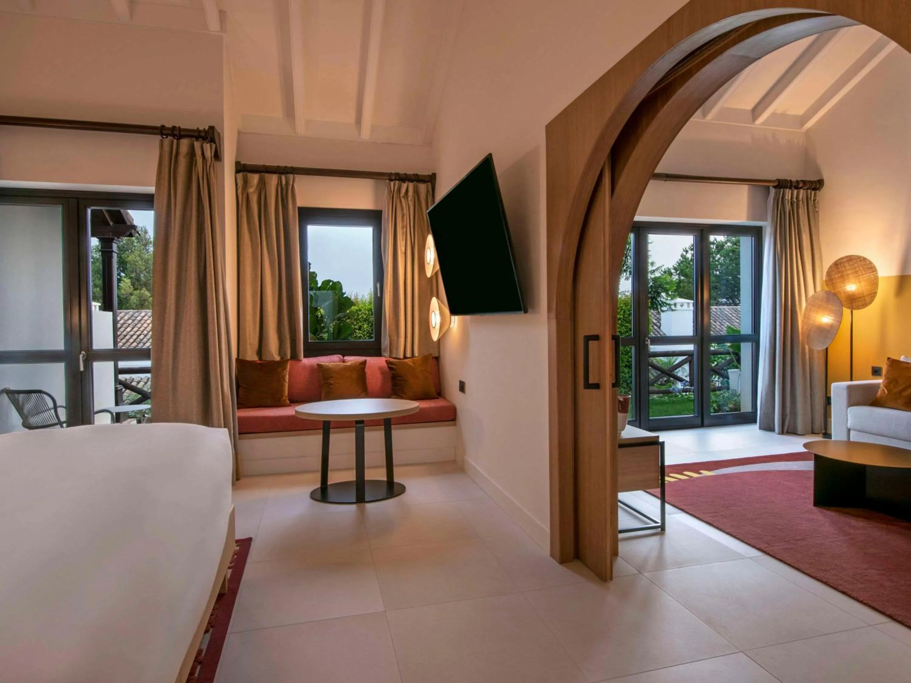 Two-Bedroom Family Suite with One King Bed and Two Double Beds in SO/ Sotogrande Spa & Golf Resort Hotel