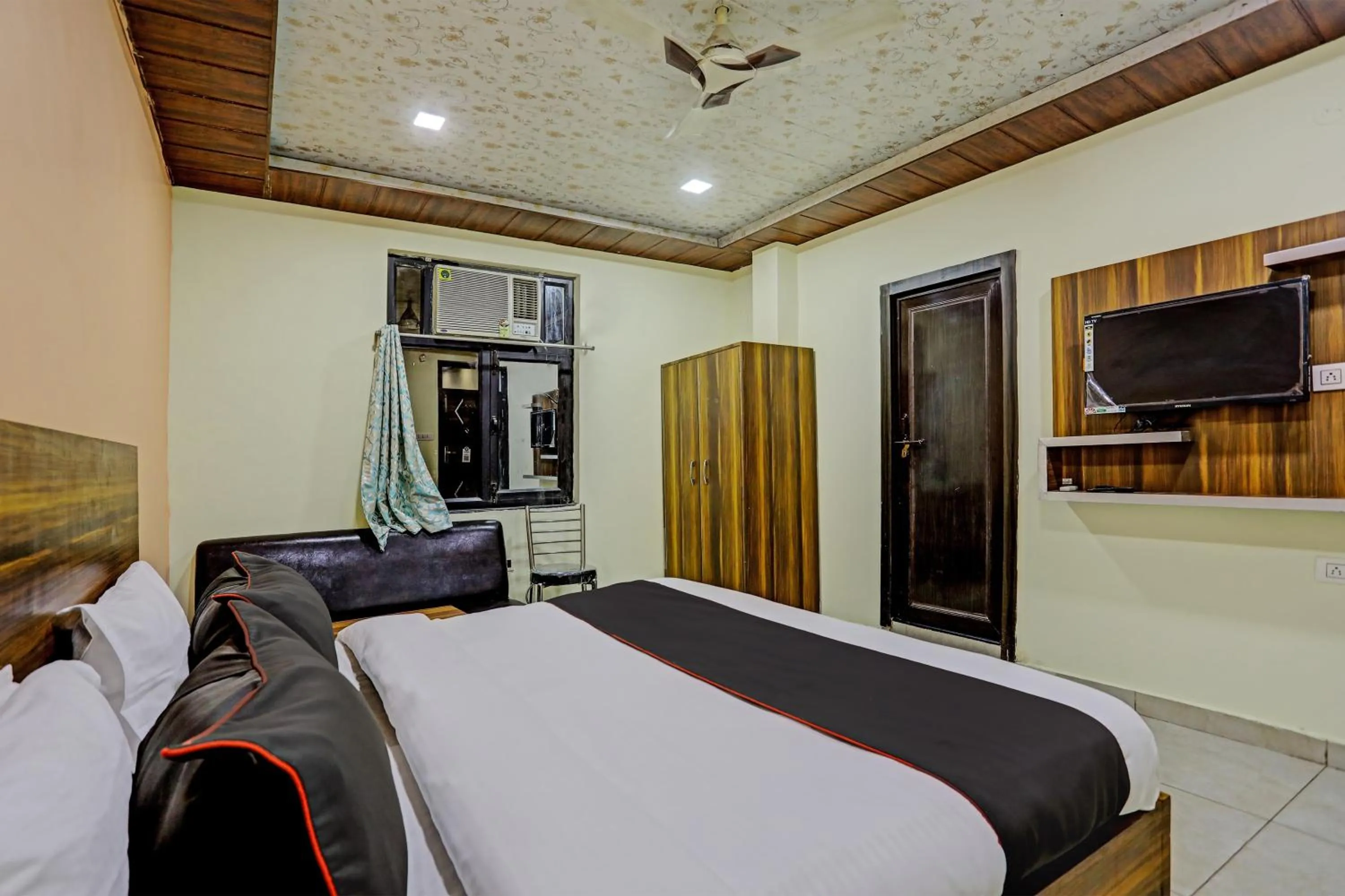 Bedroom, Bed in Hotel O by OYO Yatika Inn