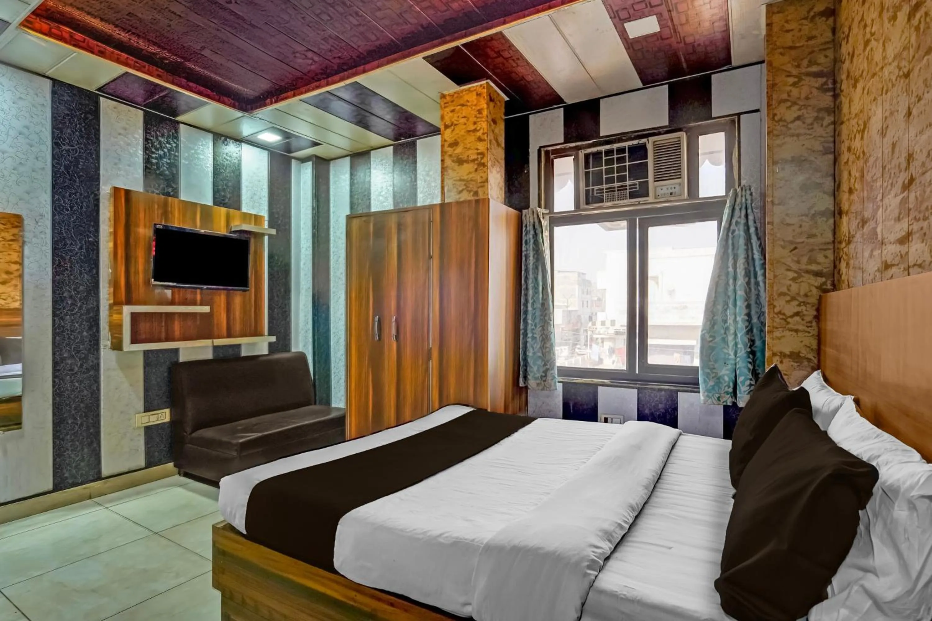 Bedroom, Bed in Super Collection O JK Temple Kanpur Formerly Yatika Inn