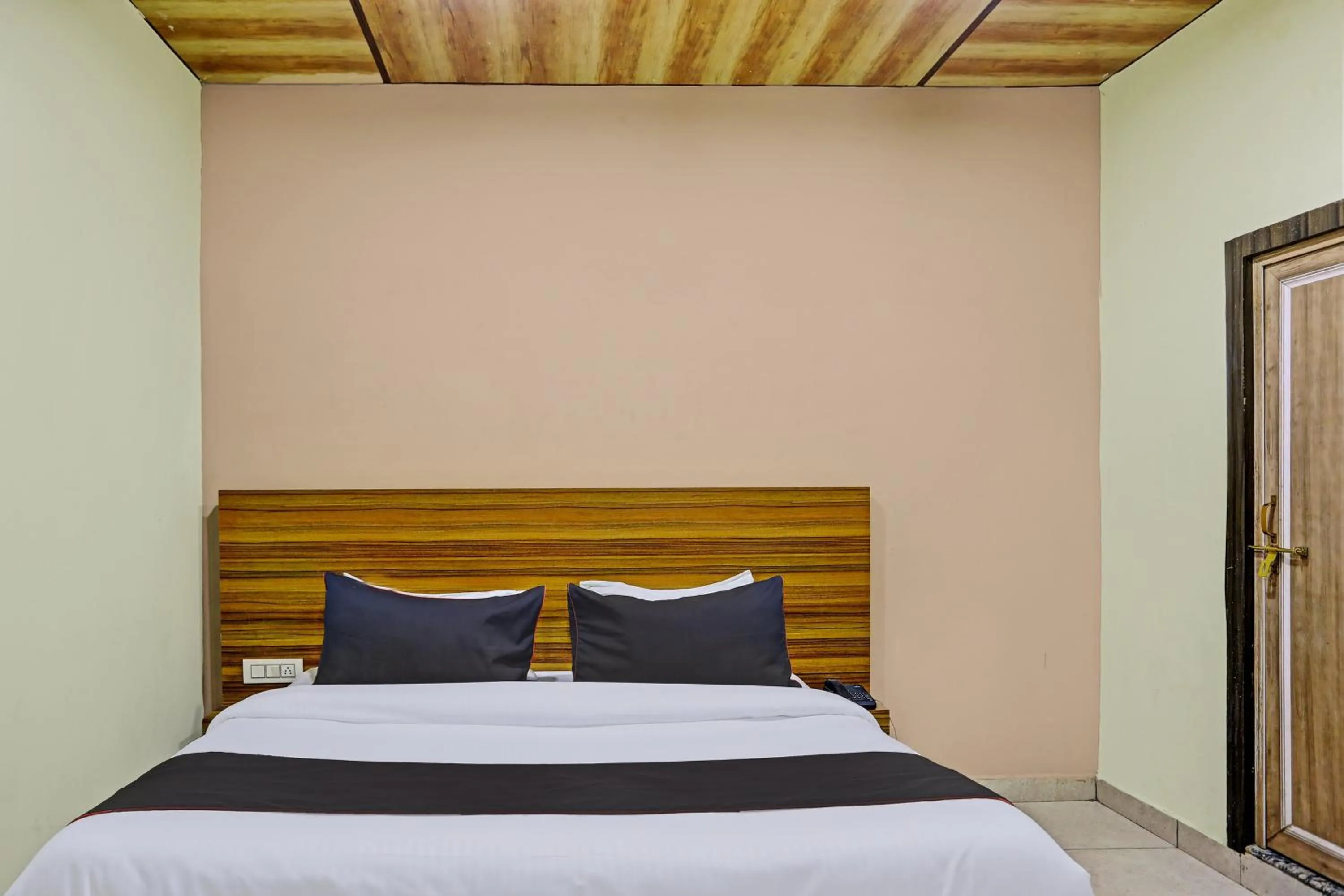 Bedroom, Bed in Hotel O by OYO Yatika Inn