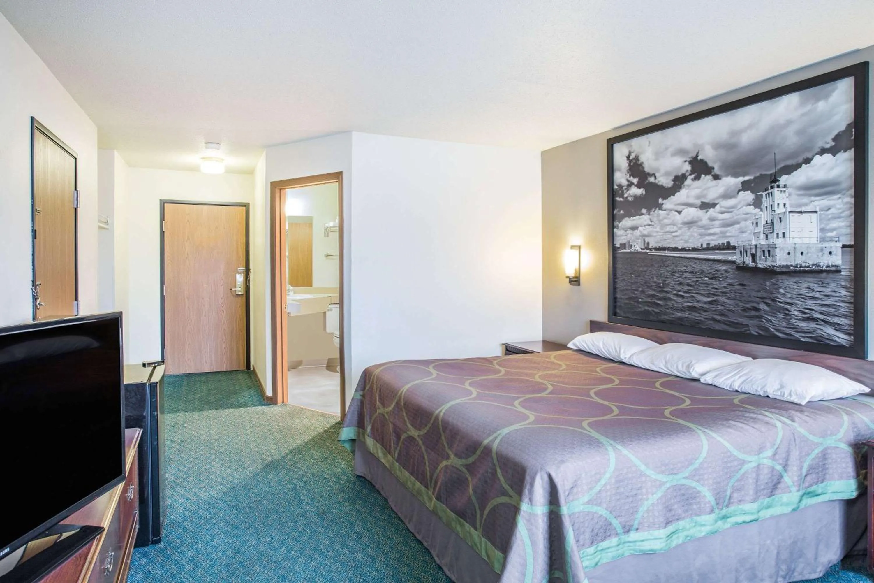 Photo of the whole room, TV/Entertainment Center in Super 8 by Wyndham Prairie Du Chien