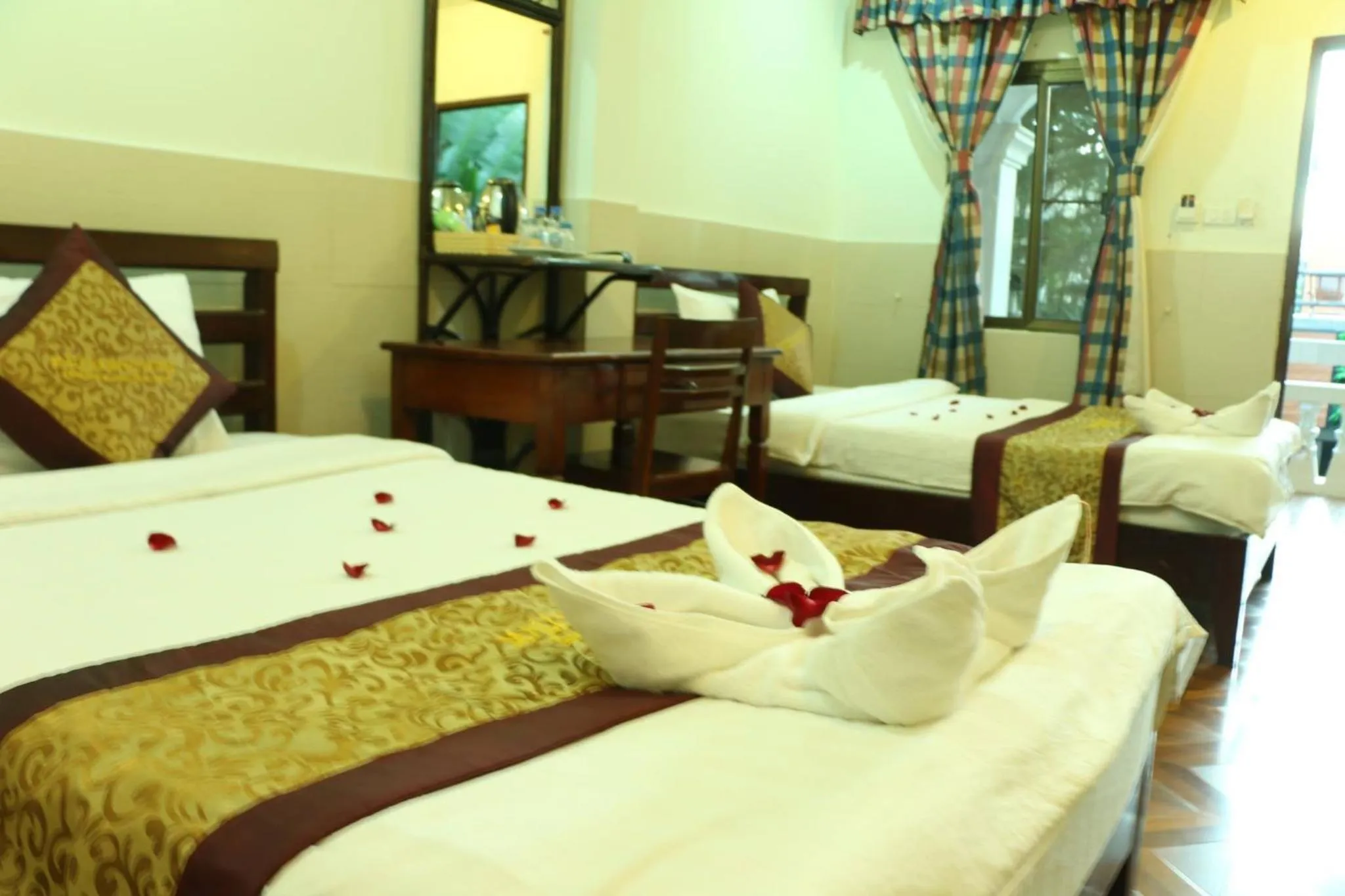 Bed in Mali Namphu Hotel