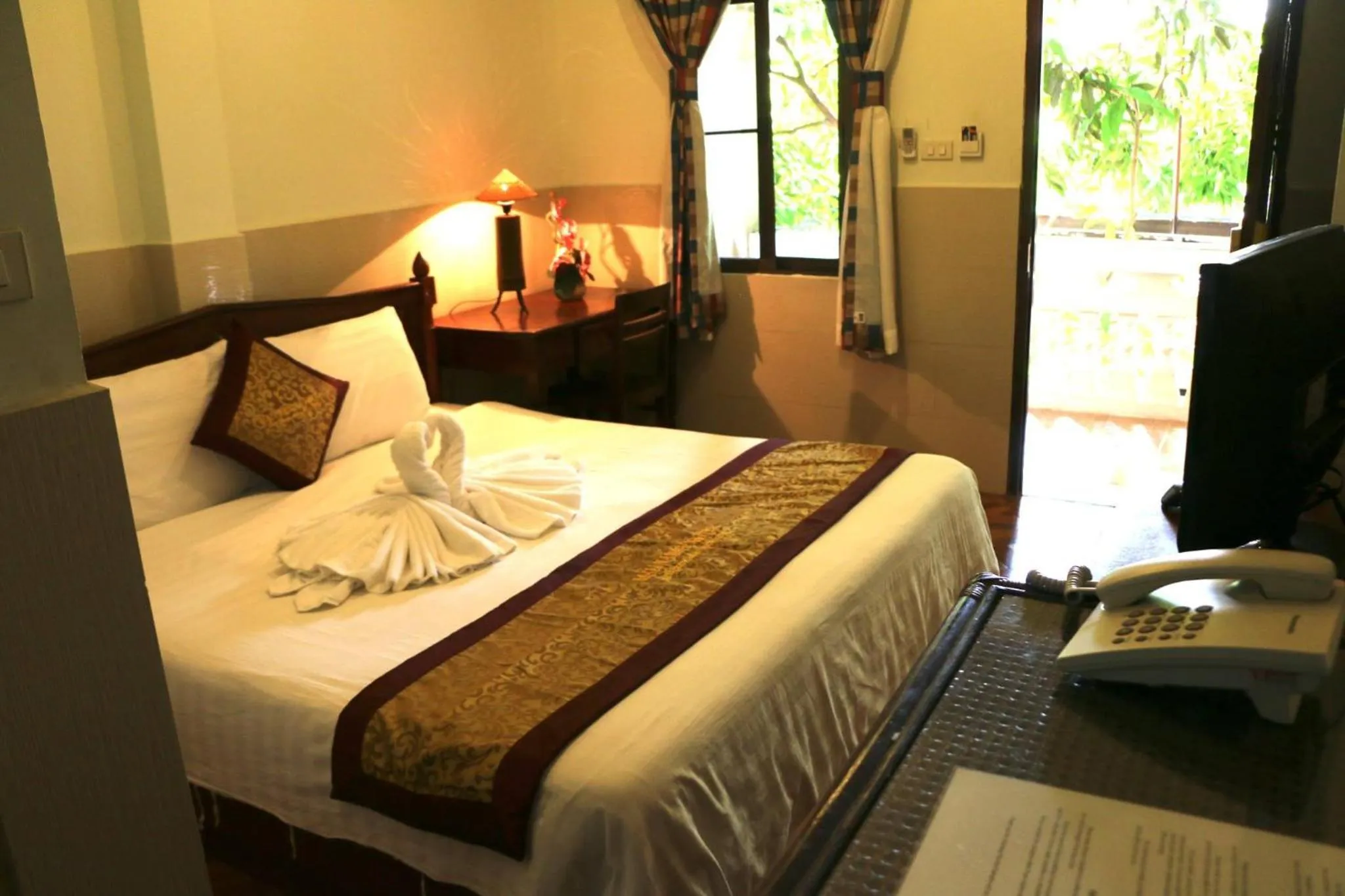 Bed in Mali Namphu Hotel