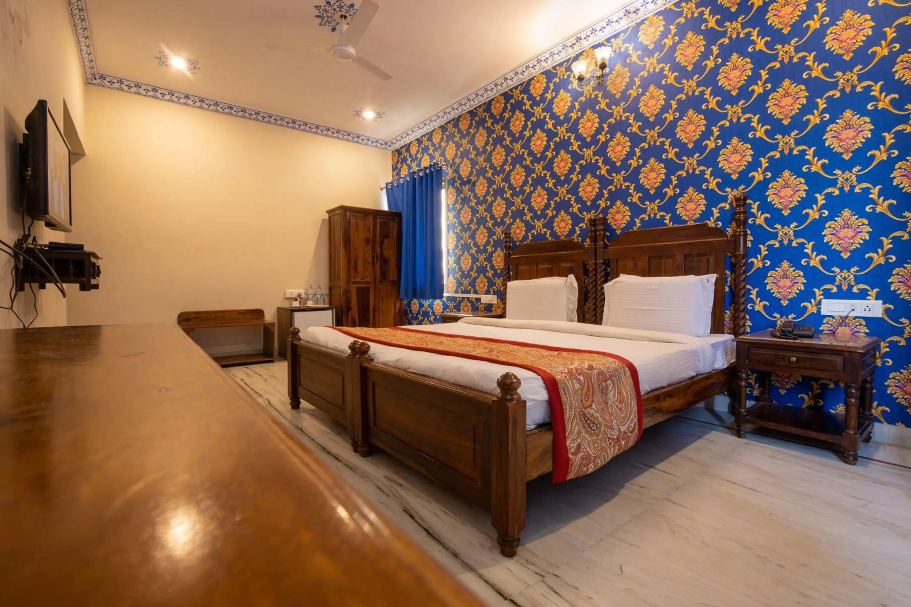 Bed in Hotel Royal Pratap Niwas