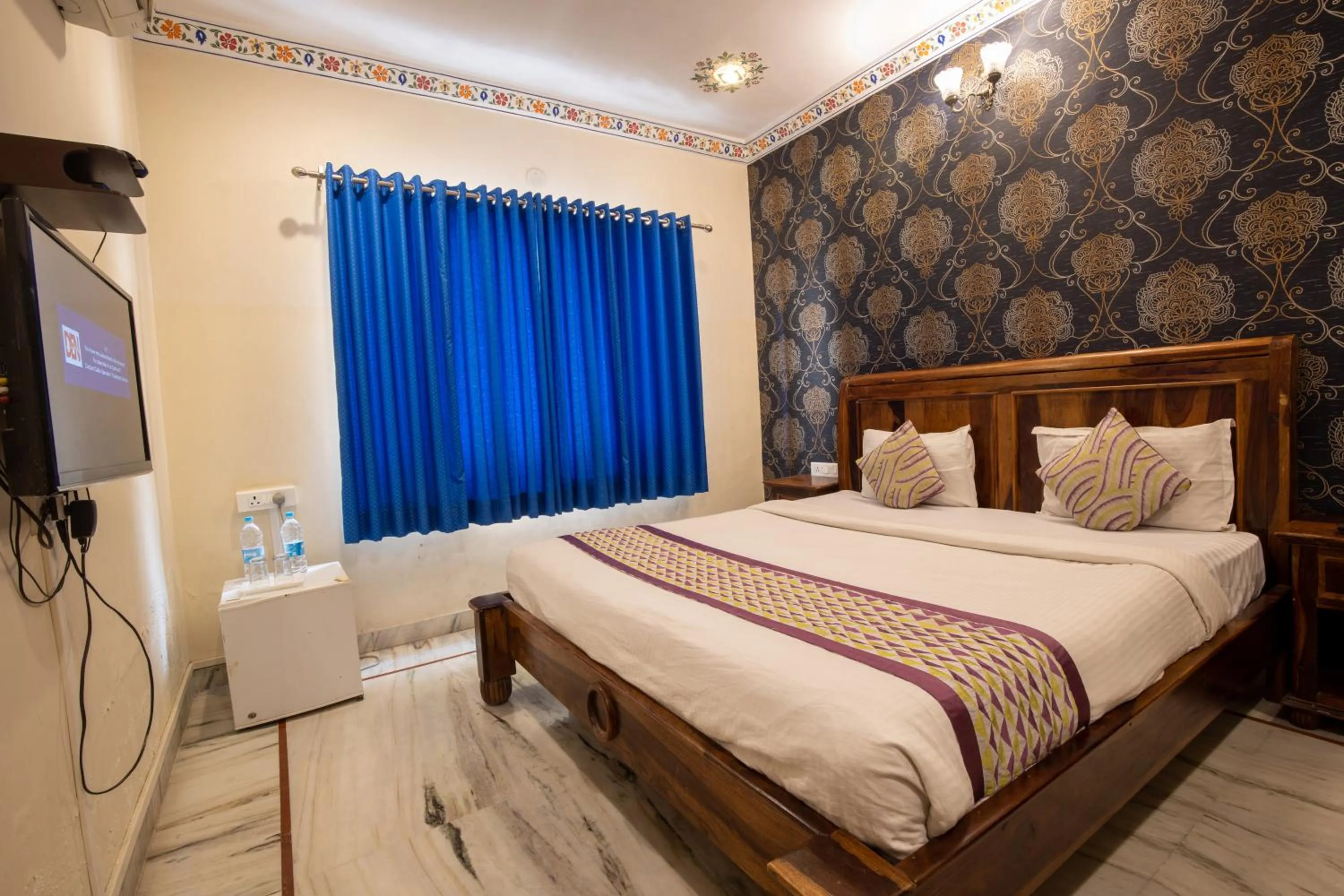 Bed in Hotel Royal Pratap Niwas