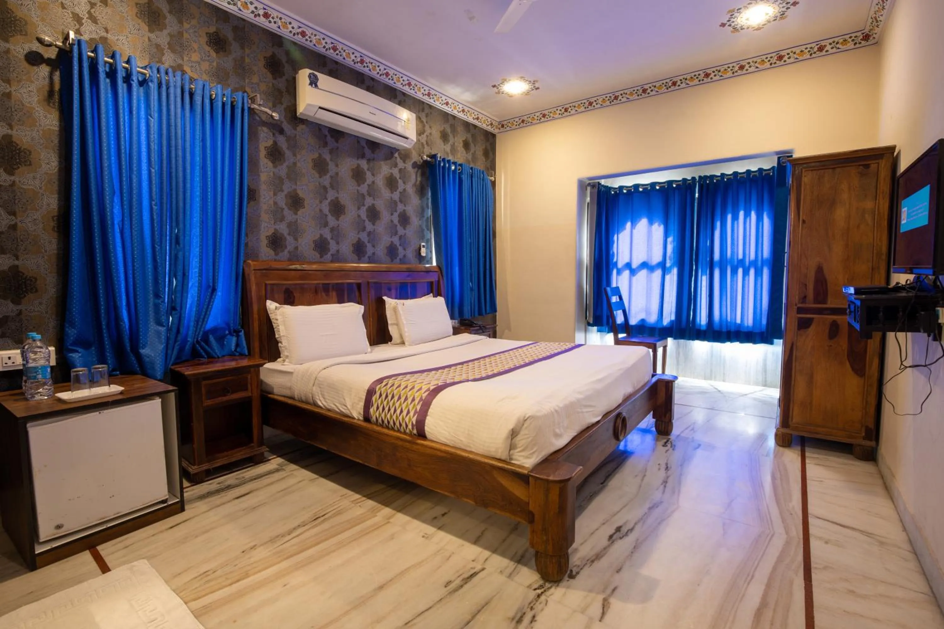 Bed in Hotel Royal Pratap Niwas