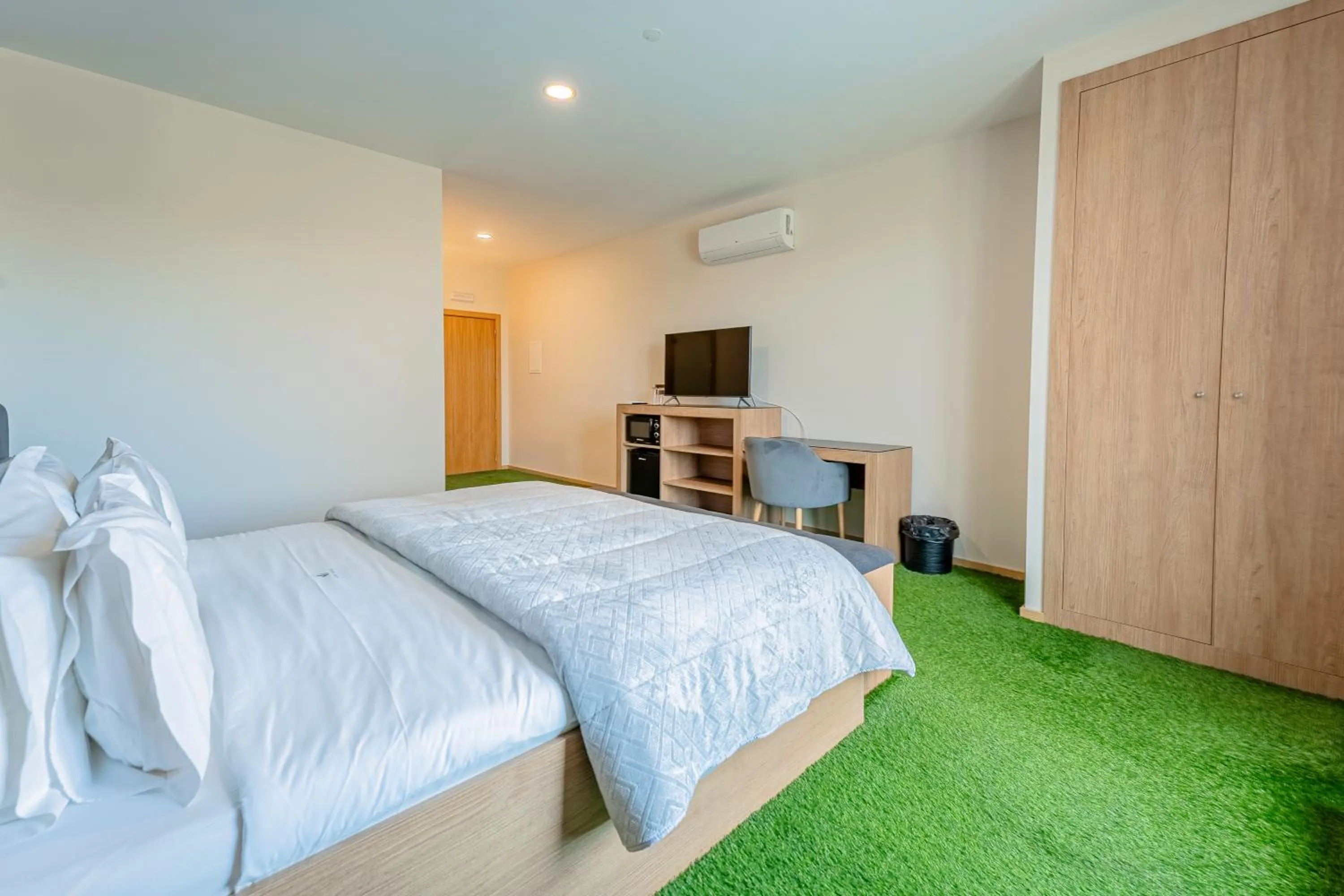 Communal lounge/ TV room, Bed in Lena Village Hotel and Spa