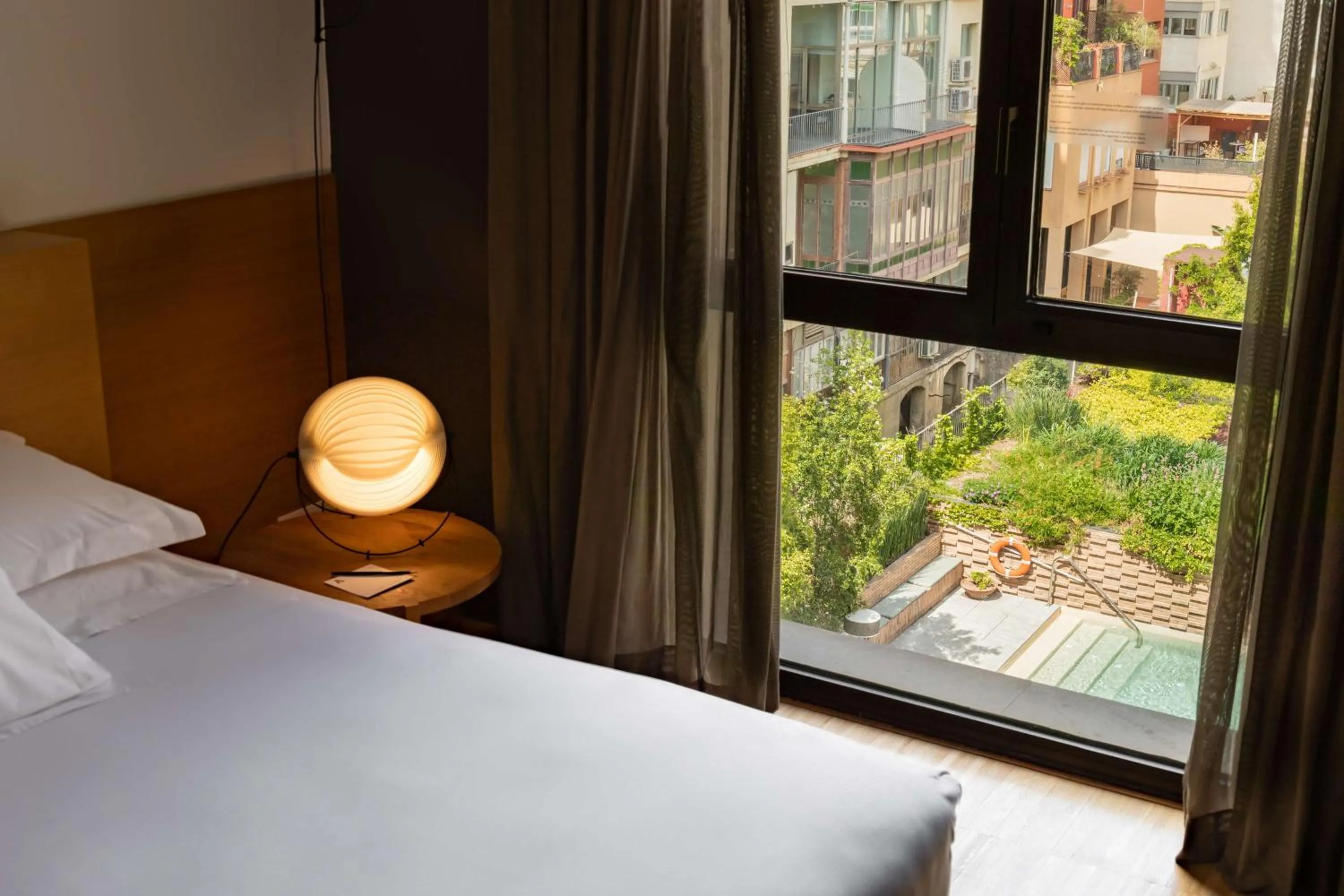 View (from property/room), Bed in Alexandra Barcelona Hotel, Curio Collection by Hilton