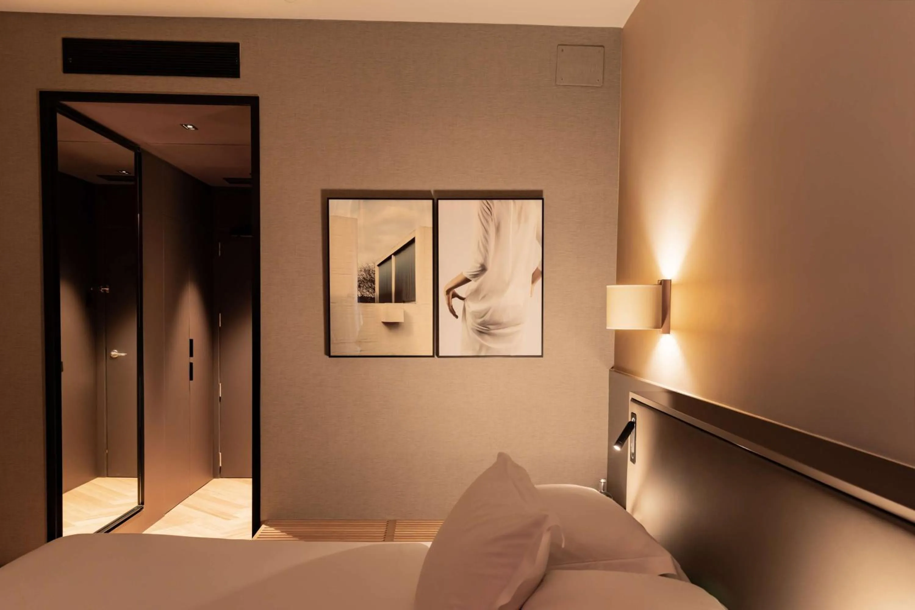 Bed in Alexandra Barcelona Hotel, Curio Collection by Hilton