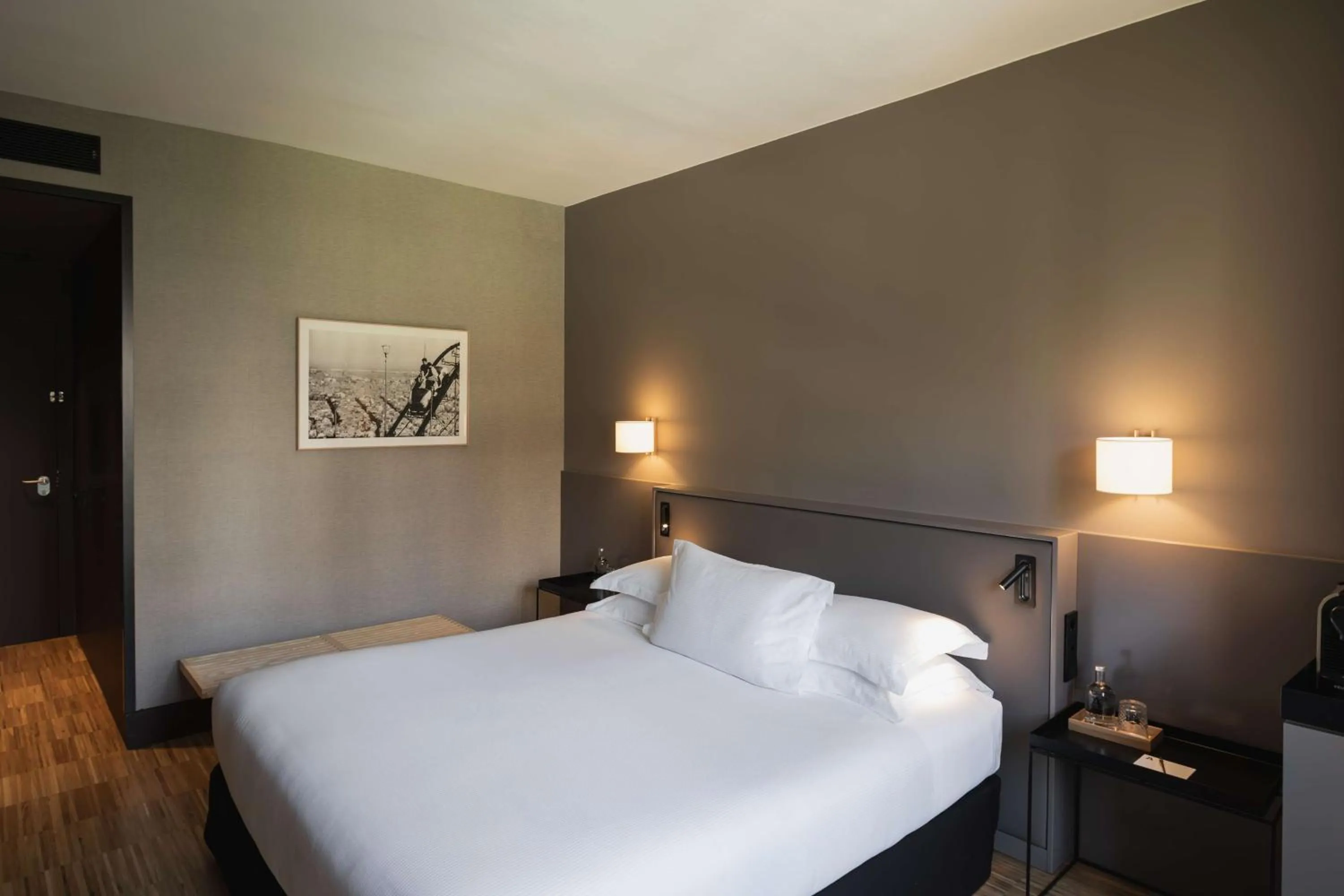 Bed in Alexandra Barcelona Hotel, Curio Collection by Hilton