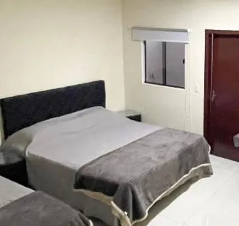 Bed in España Suites Hotel