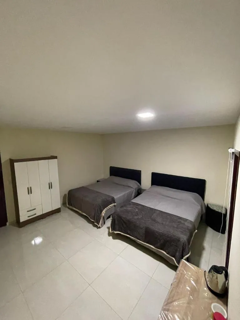 Bed in España Suites Hotel