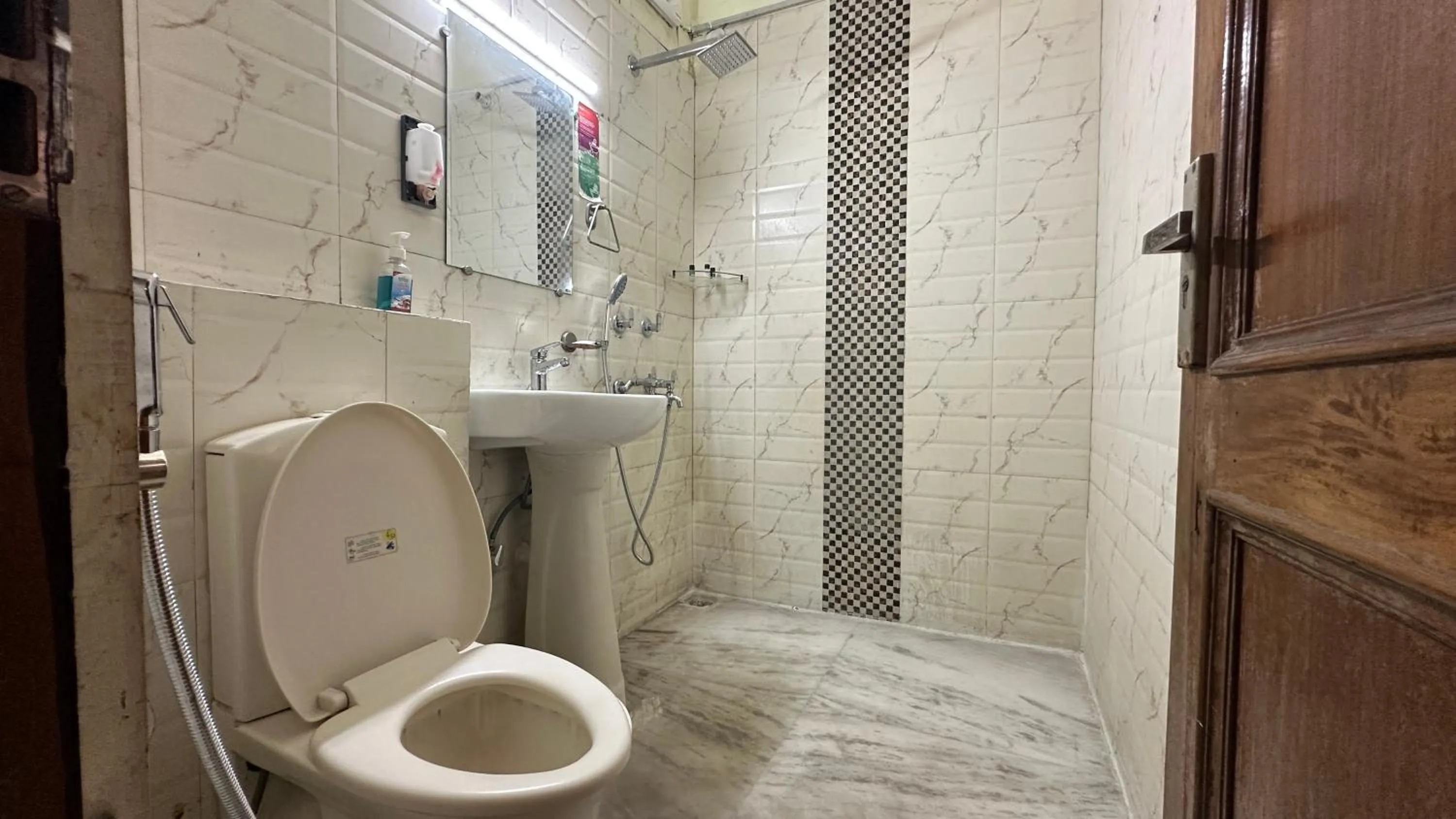 Toilet in Hotel Ashray Noida