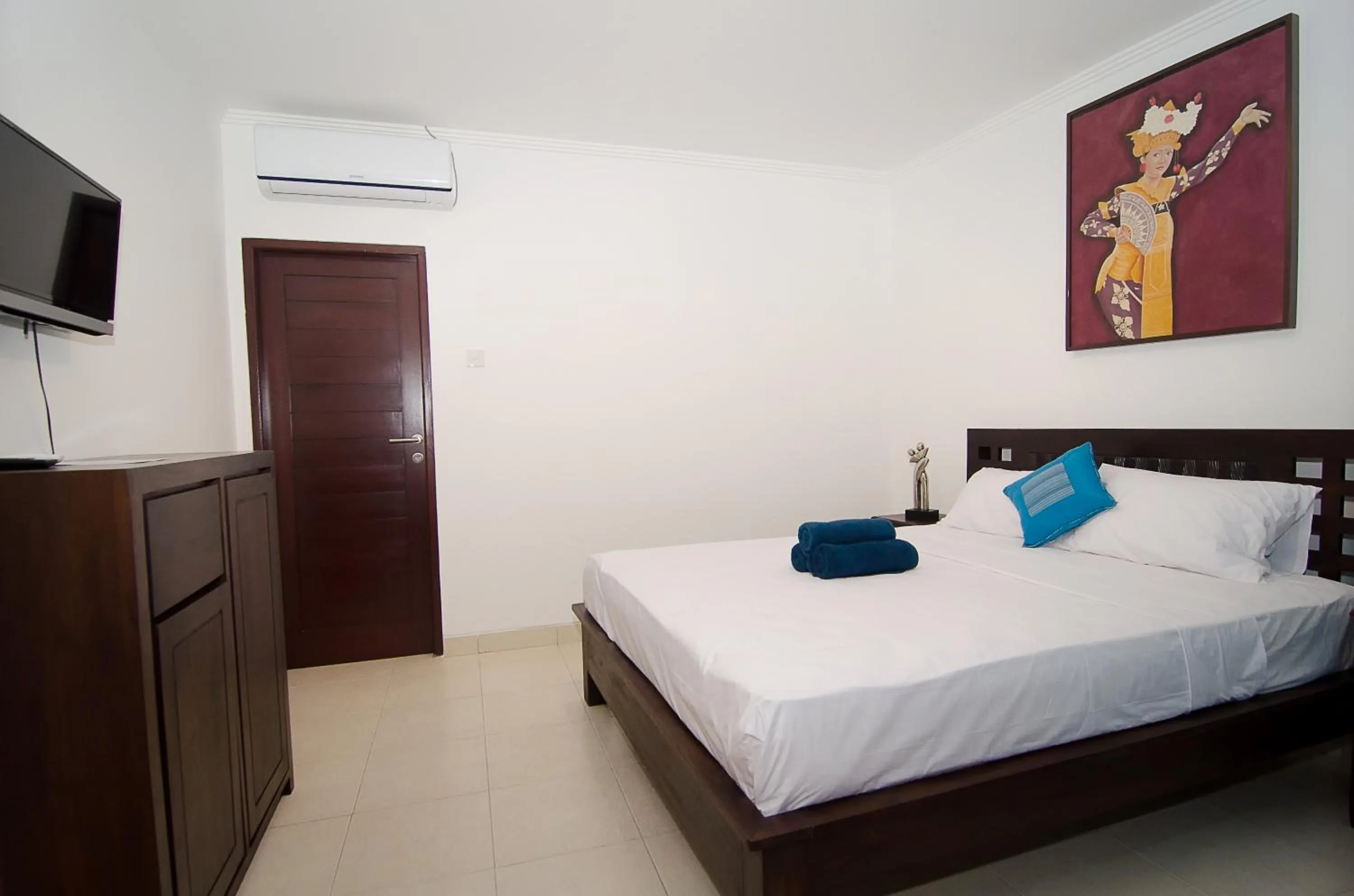 Photo of the whole room, Bed in Sanur Guest House