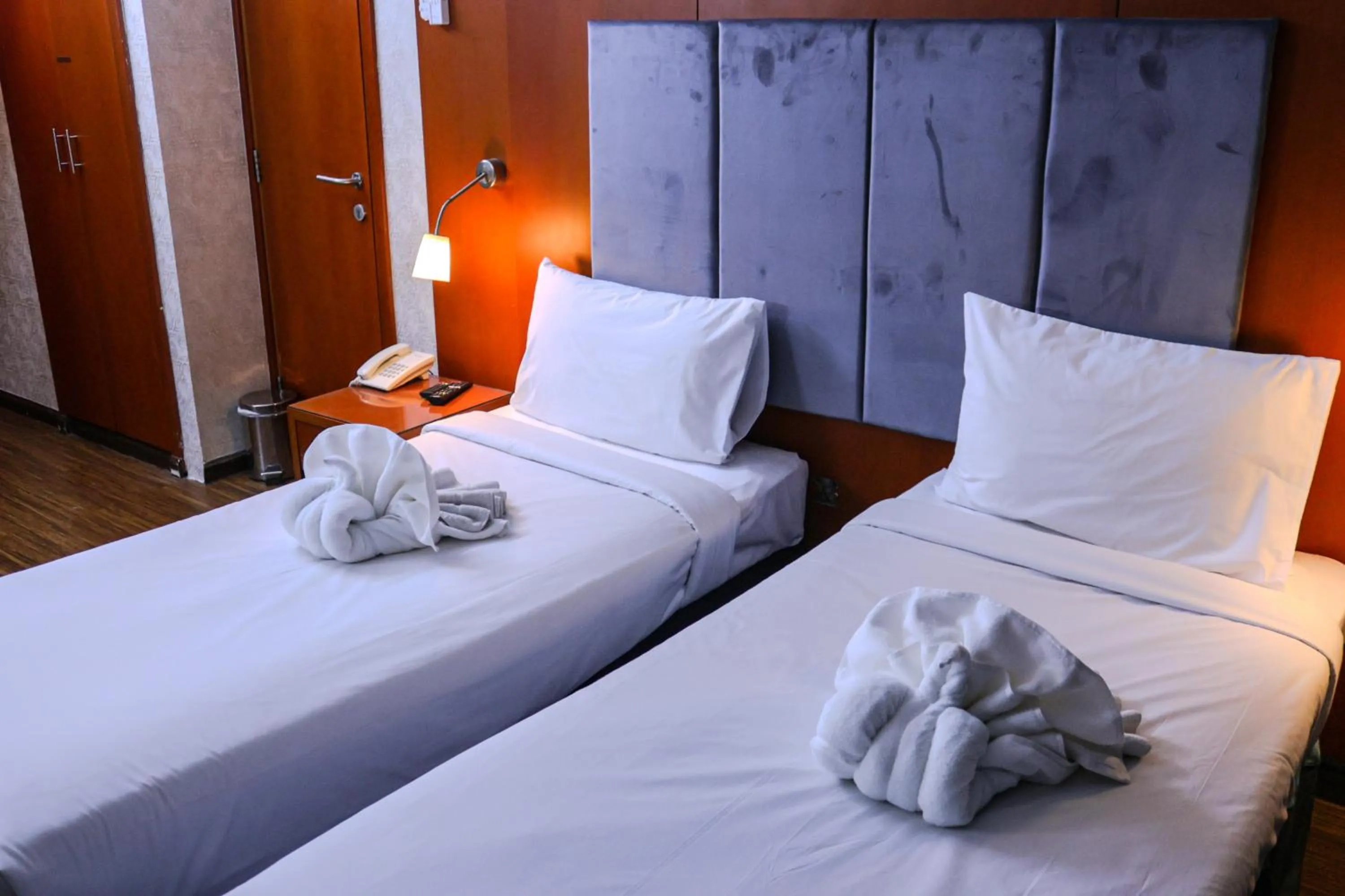 Bed in BOONMAX Hotel