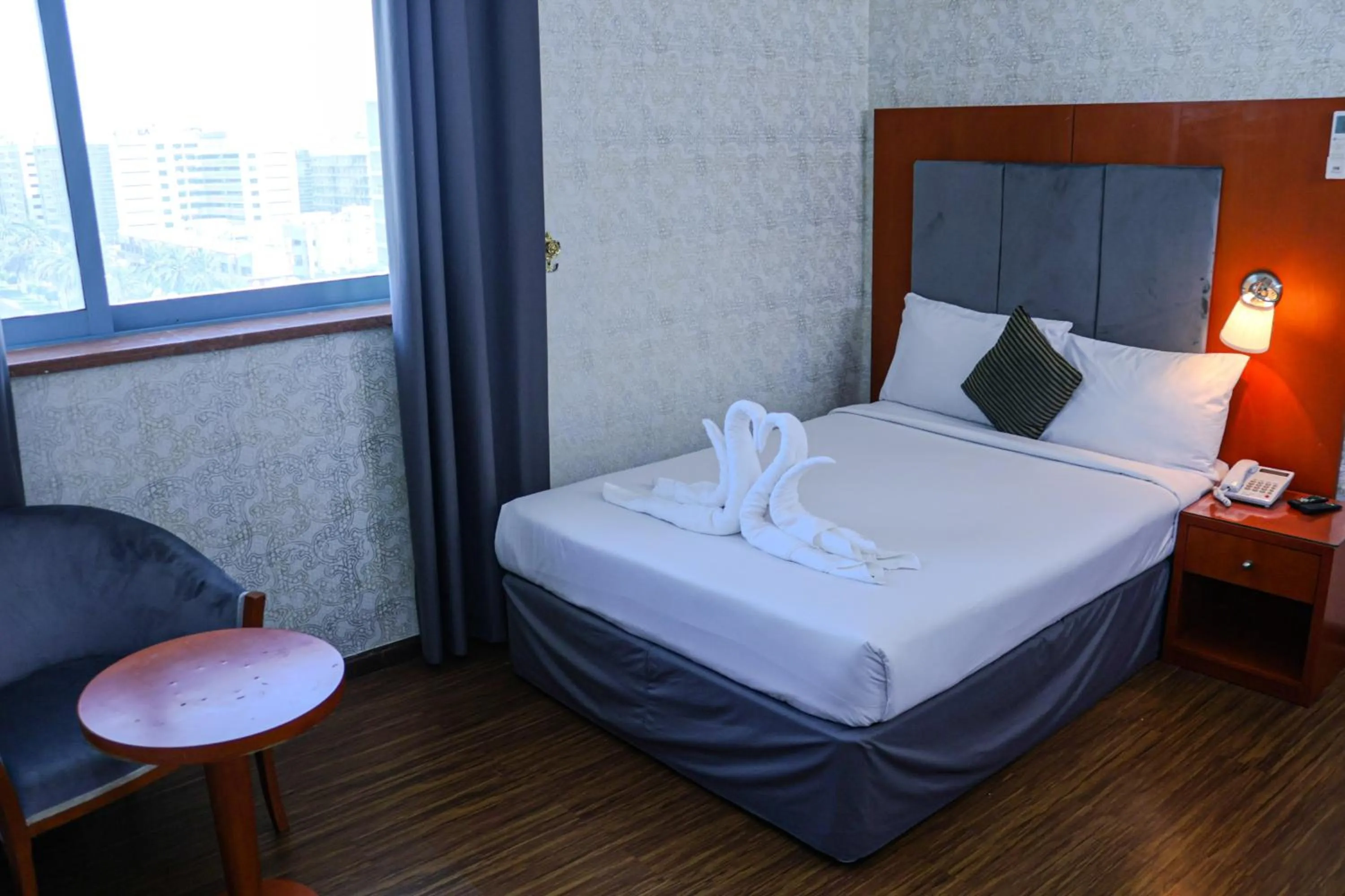 Bed in BOONMAX Hotel