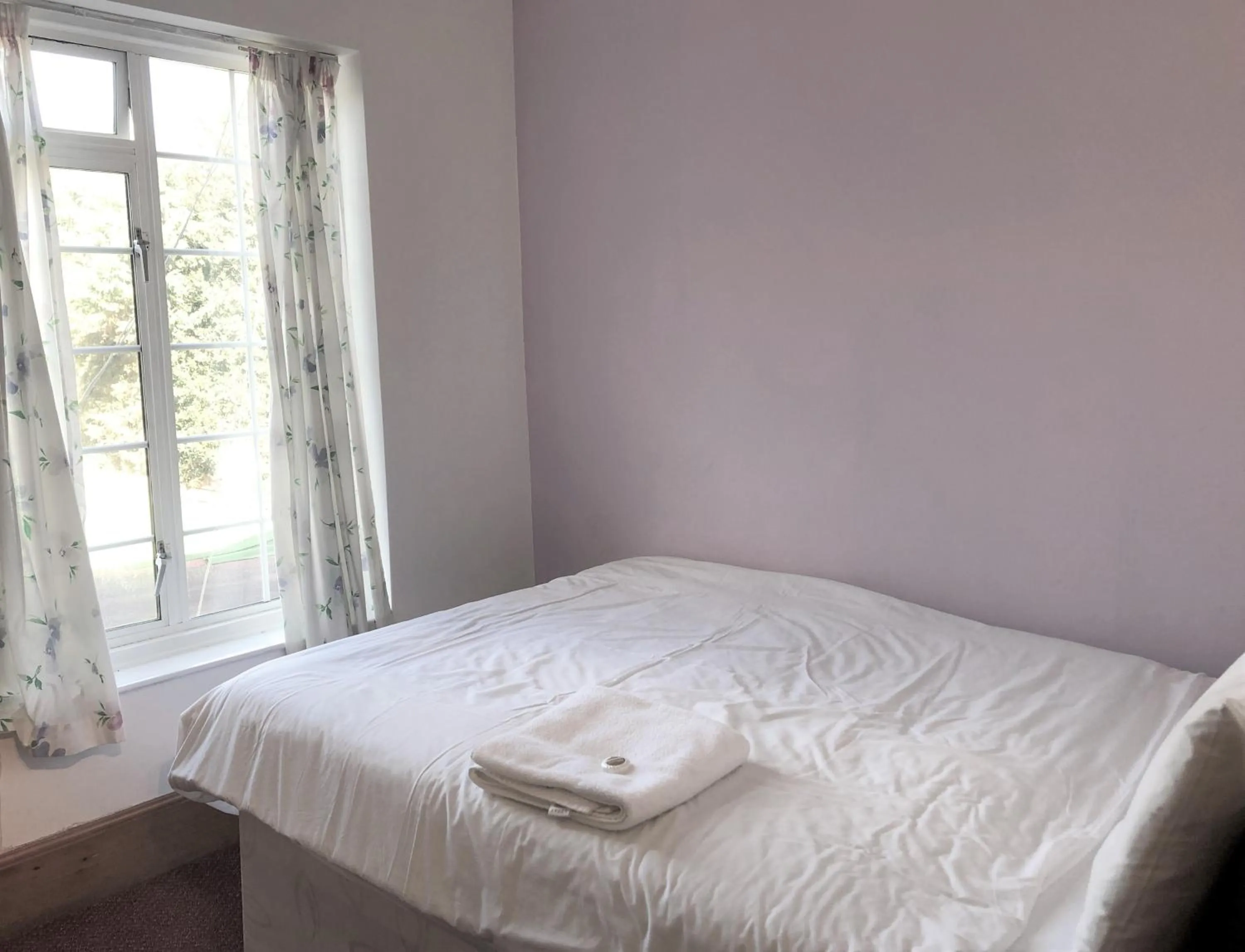 Bed in Lyttleton Guest House Limited