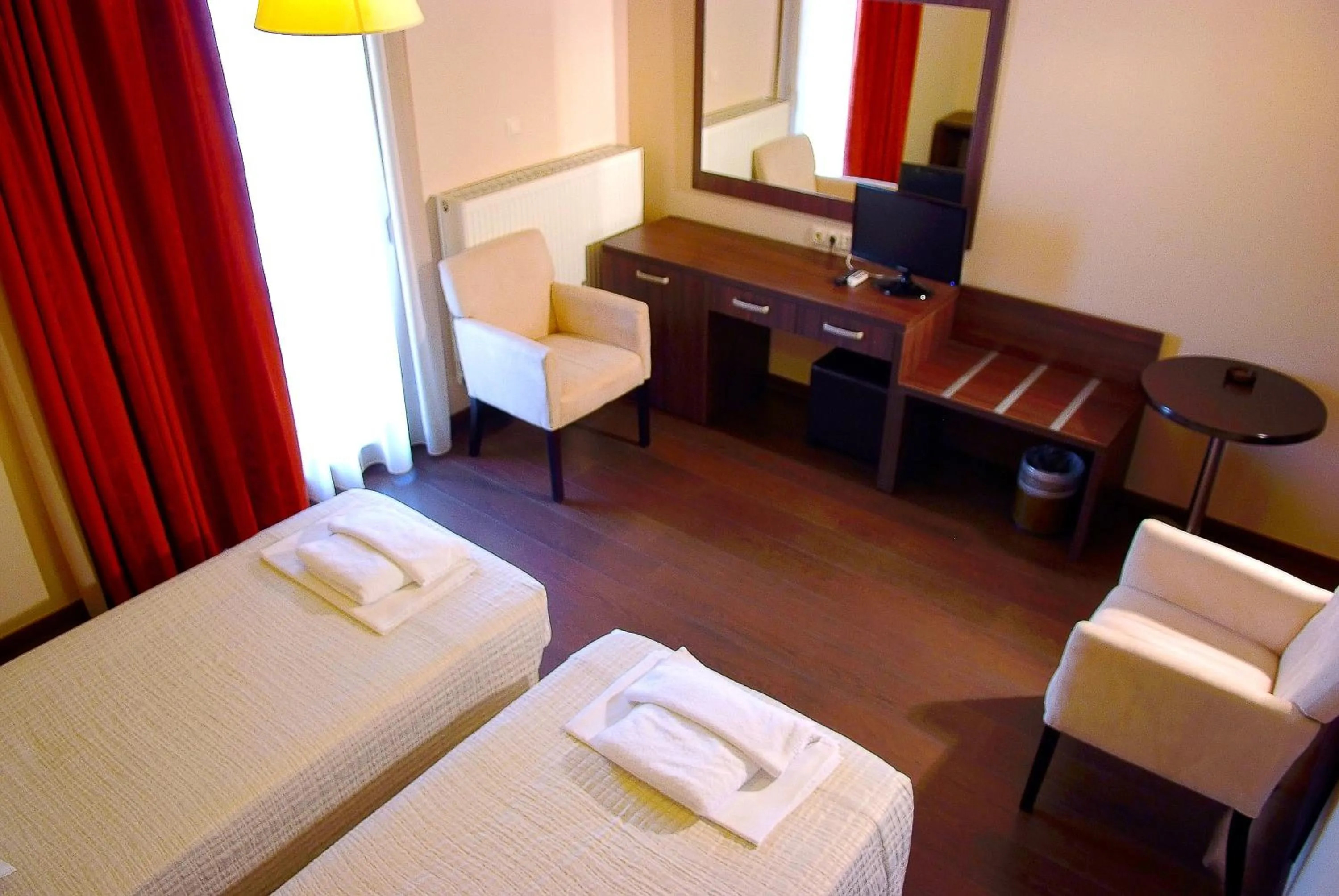 Bedroom in Plotini Hotel