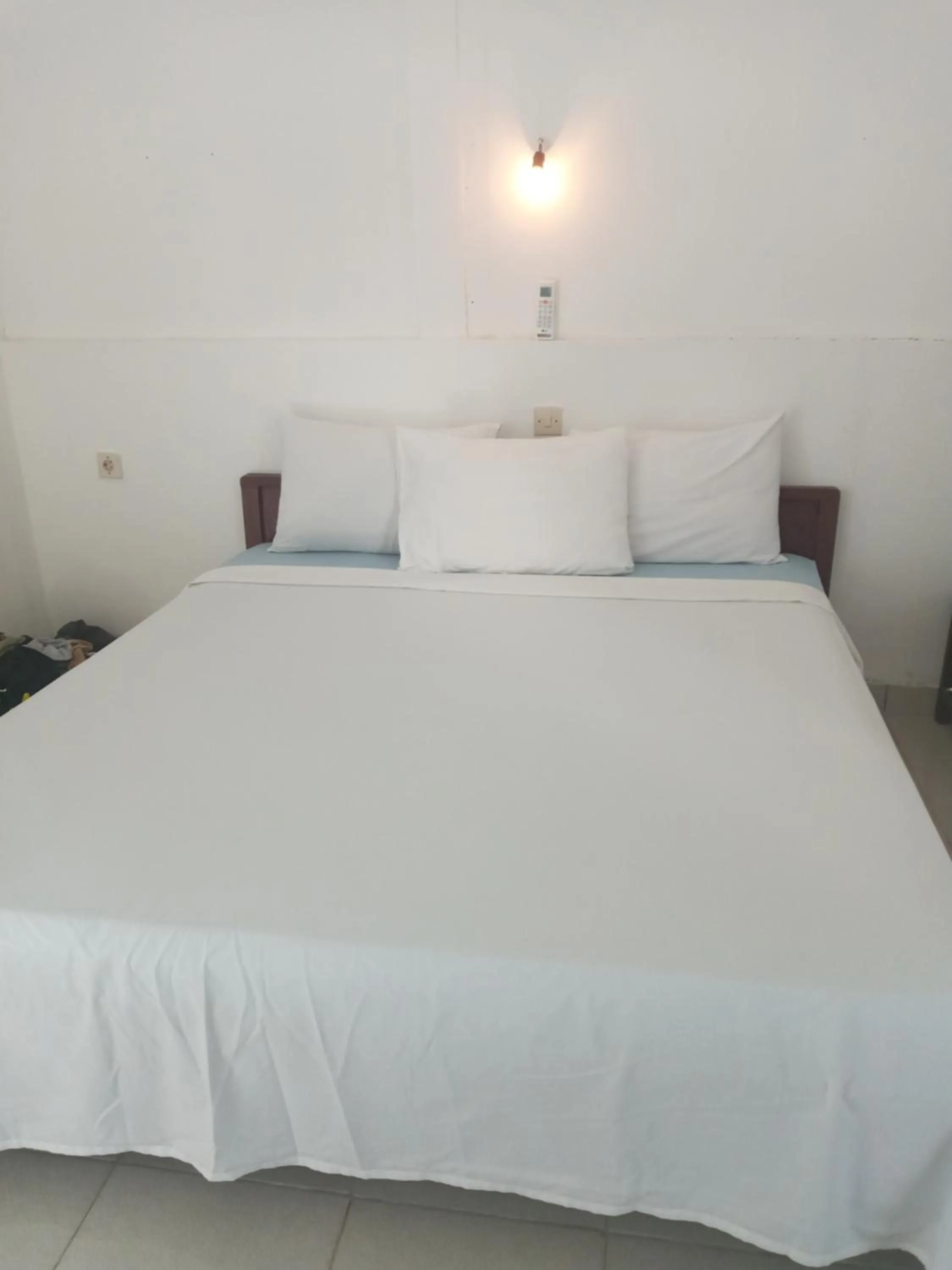 Bed in BUKIT GARDEN Guest House