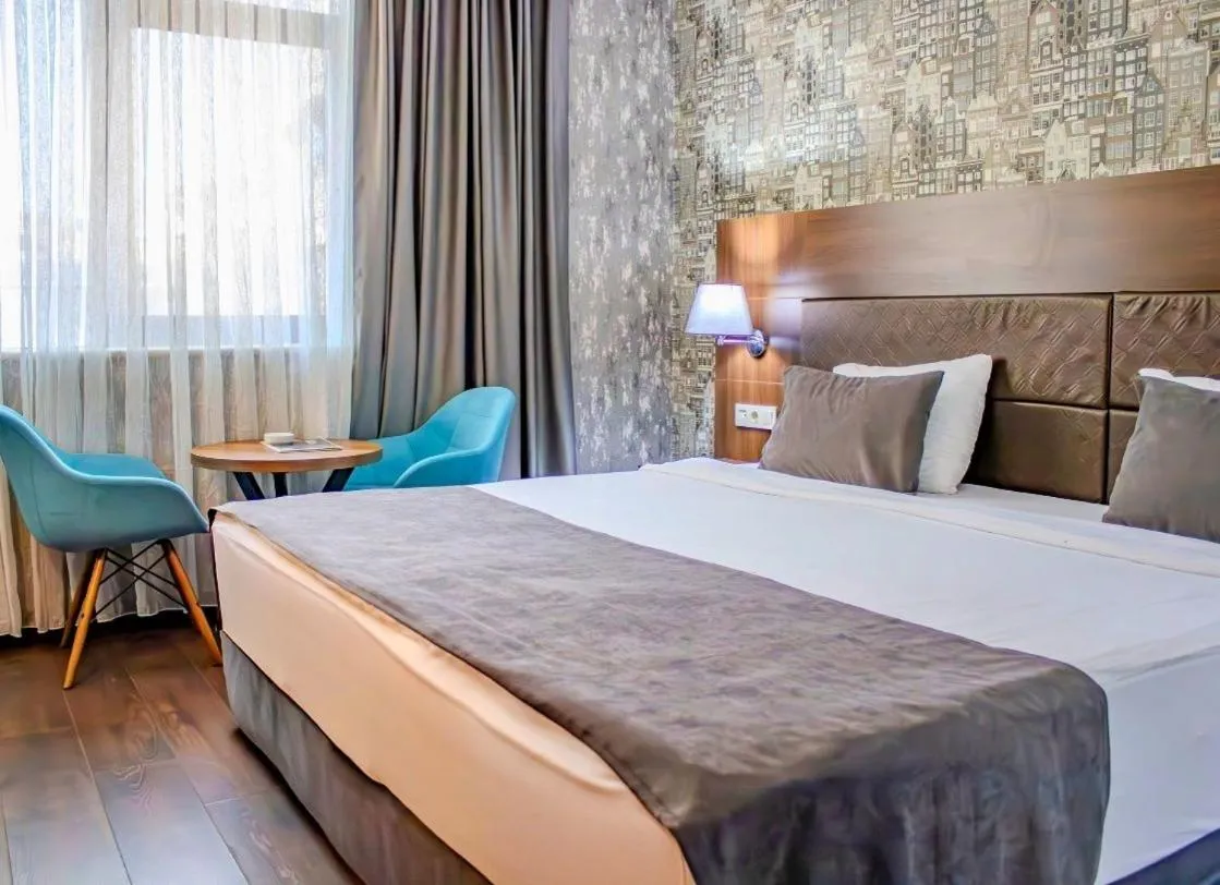 Bed in Ma City Hotel