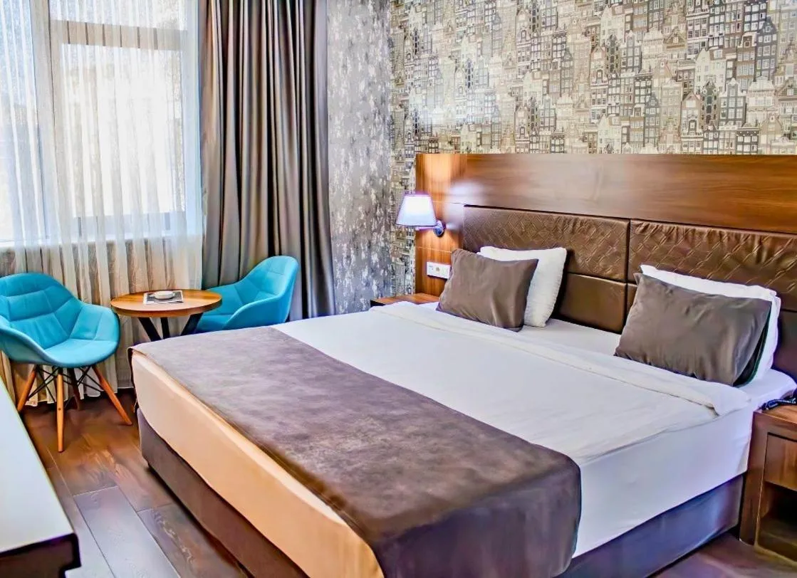 Bed in Ma City Hotel