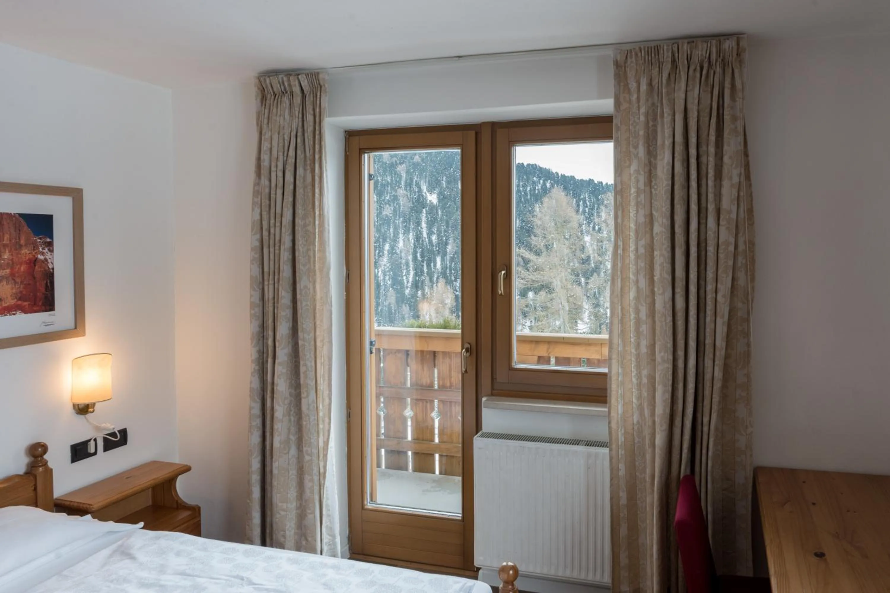 Bed in PLOSE Parkhotel & Residence