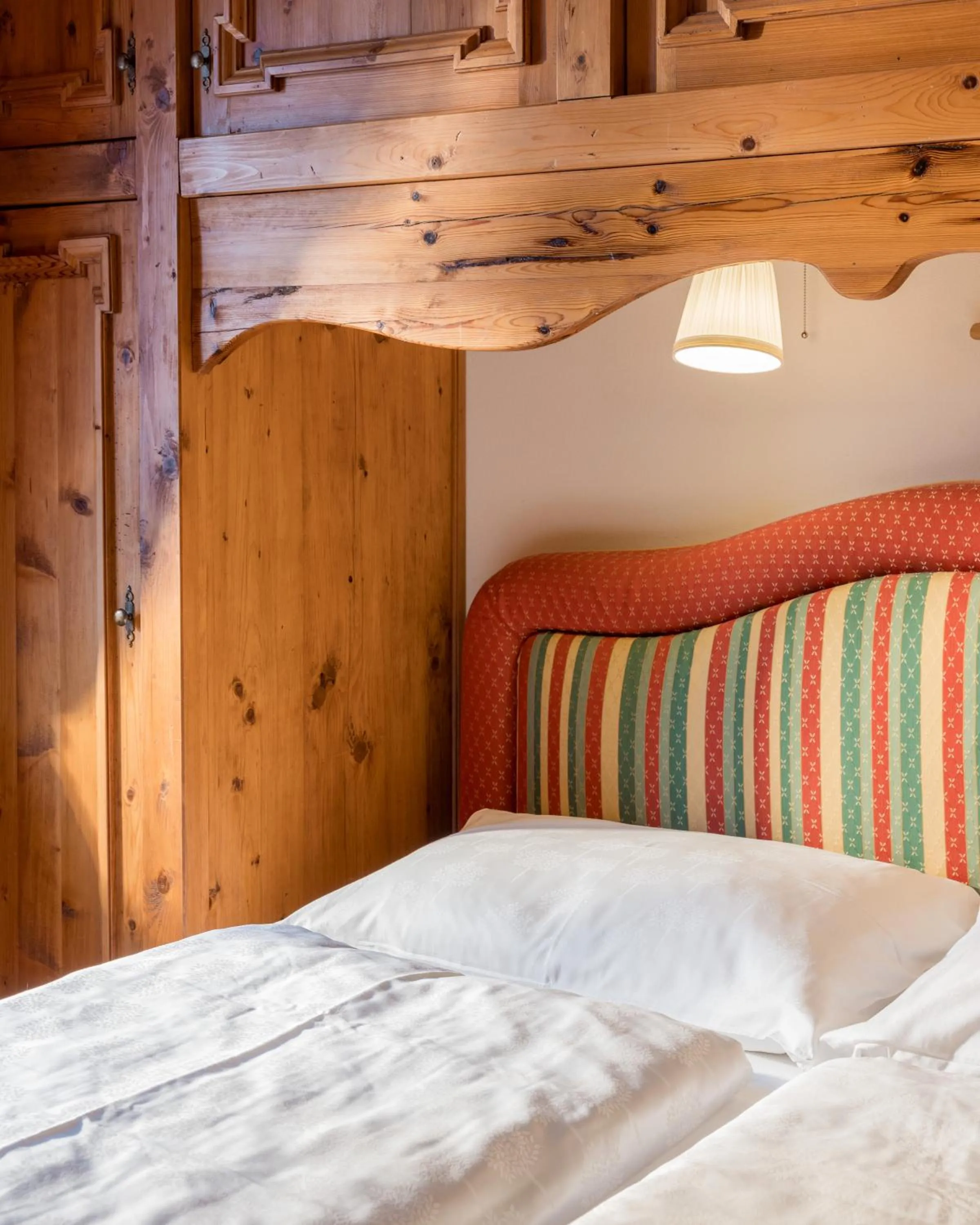 Bed in PLOSE Parkhotel & Residence