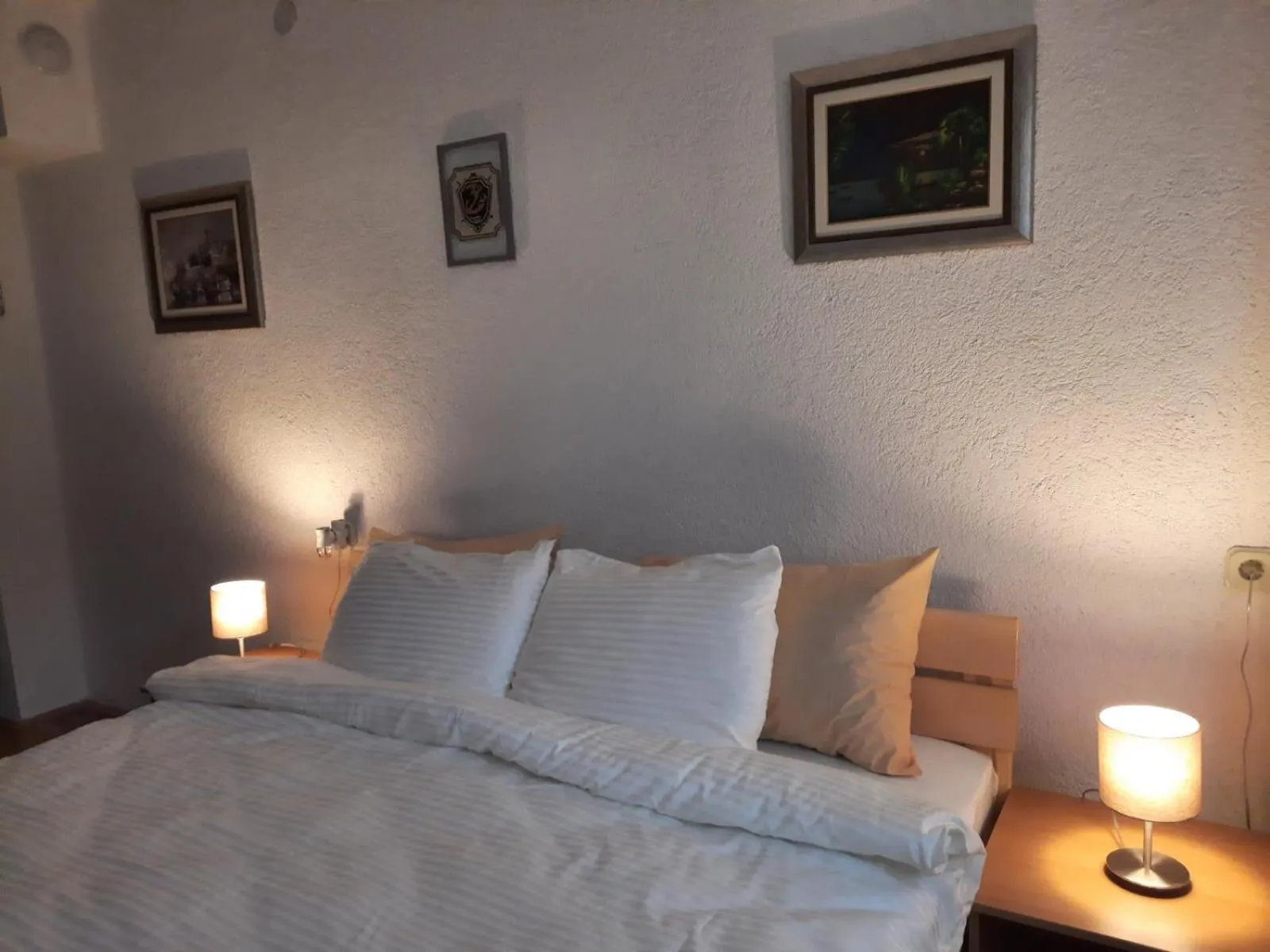 Bed in Bogdanoski Studios & Guest Rooms