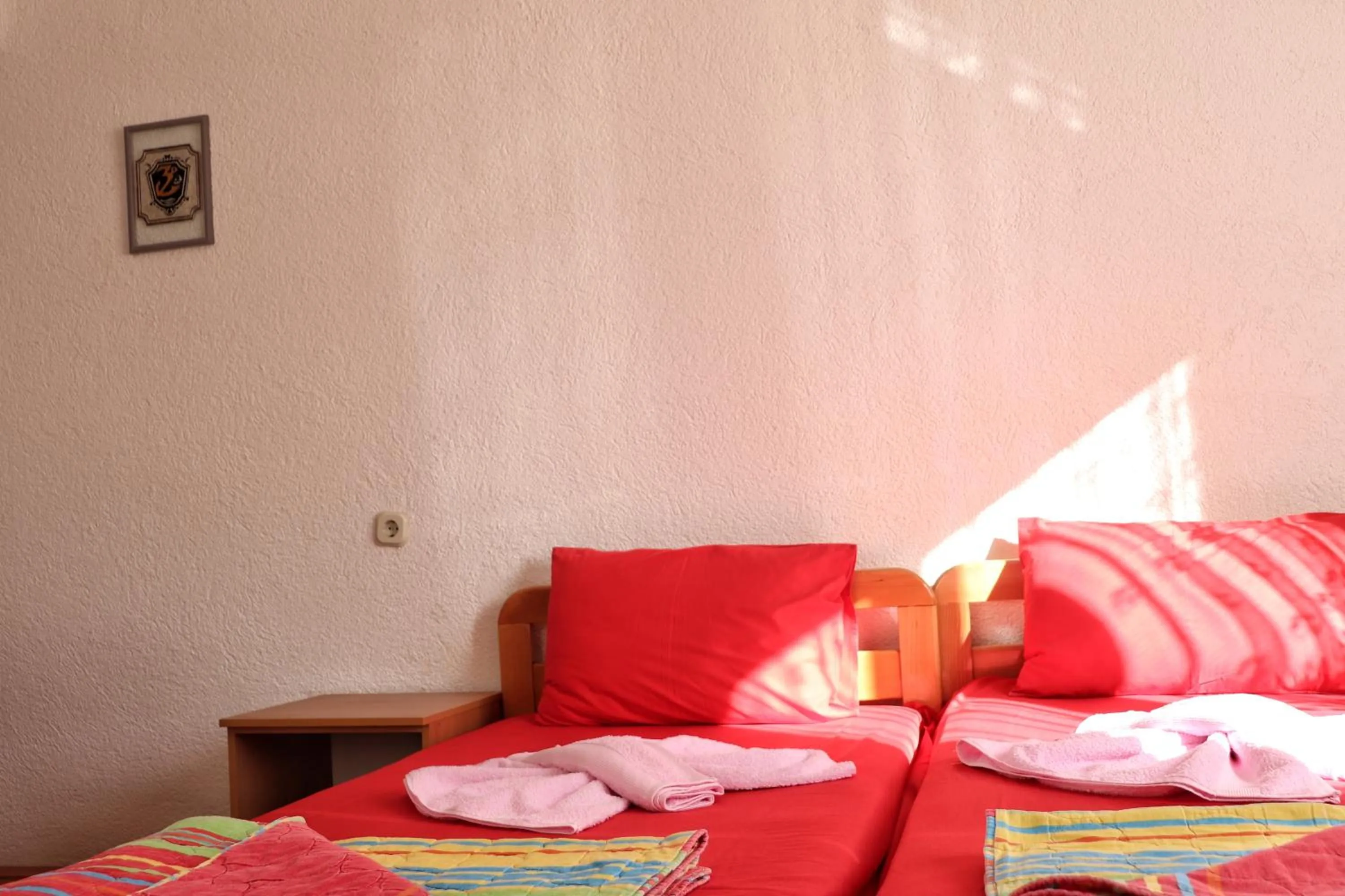 Bed in Bogdanoski Studios & Guest Rooms