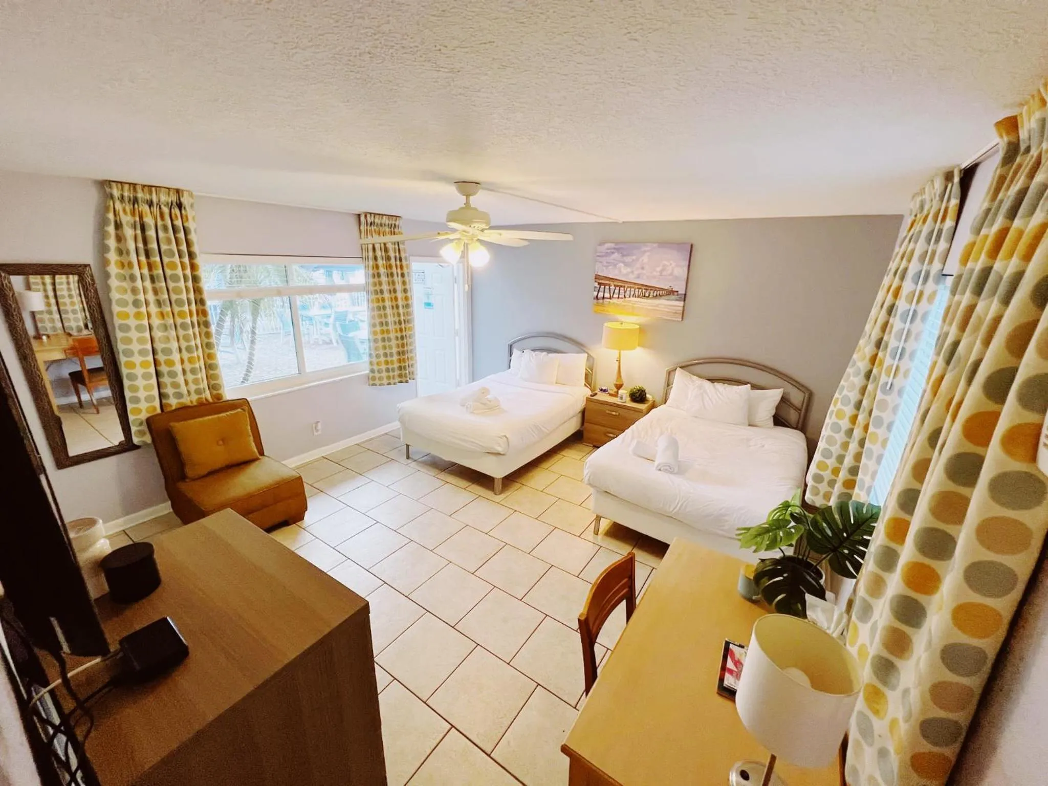 Bed in Great Escape Apartments By Lowkl