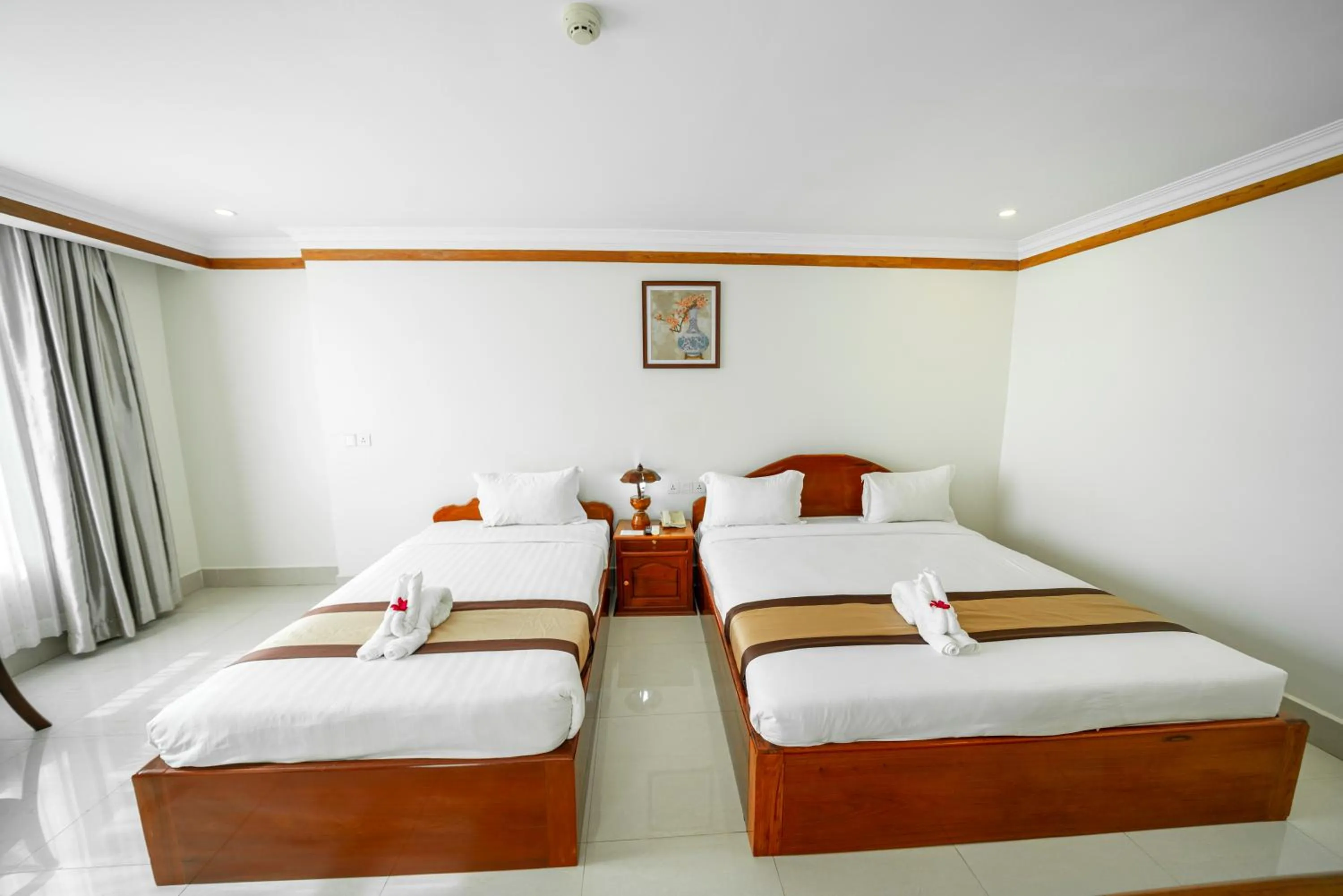 Bed in Pursat Riverside Hotel & Spa