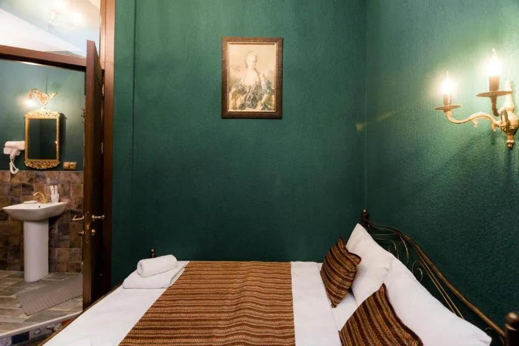 Bed in Vorontsoff Inn Boutique Hotel