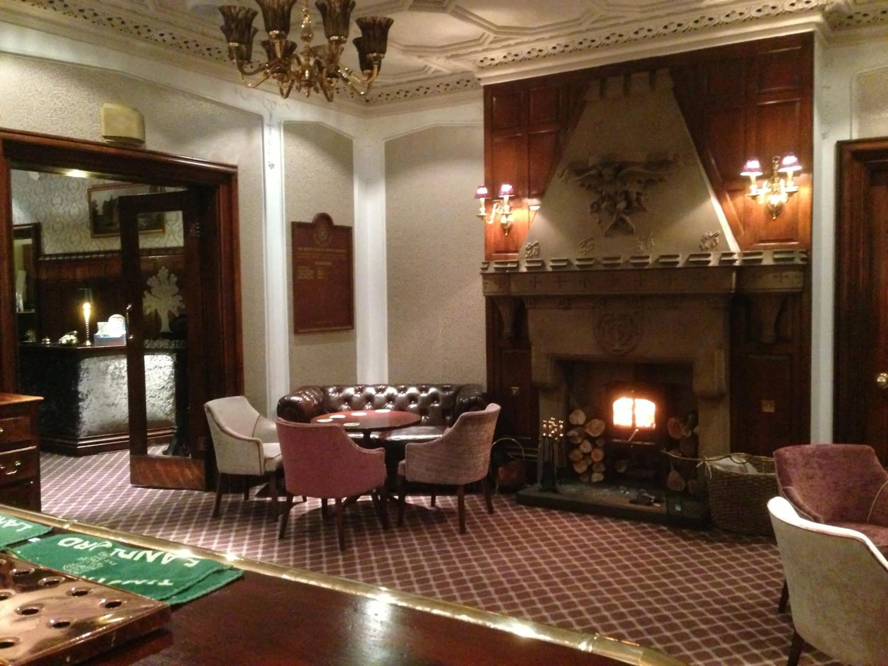 Communal lounge/ TV room in Oakwood Hall Hotel