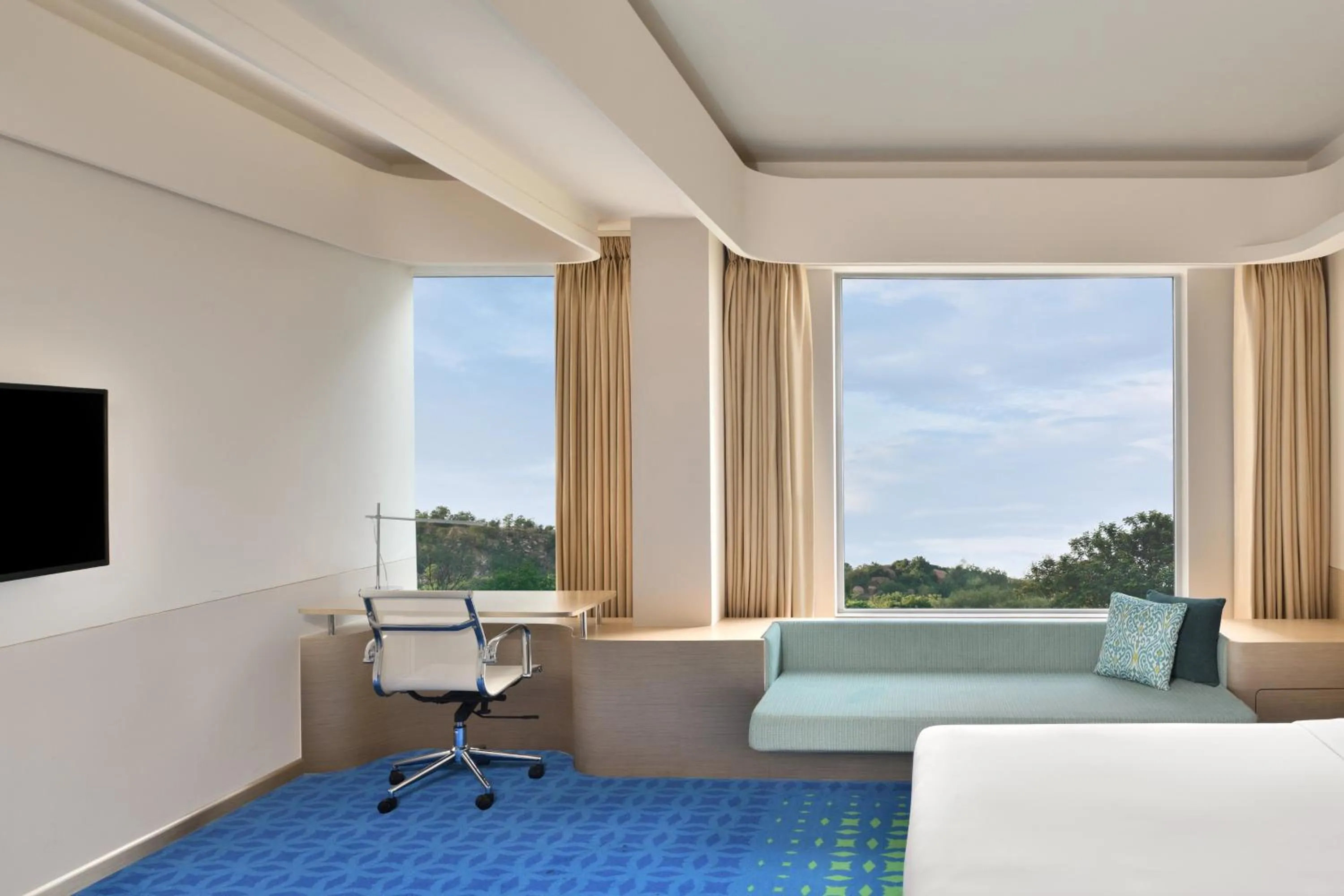 Photo of the whole room, Bed in Fairfield by Marriott Hyderabad Gachibowli