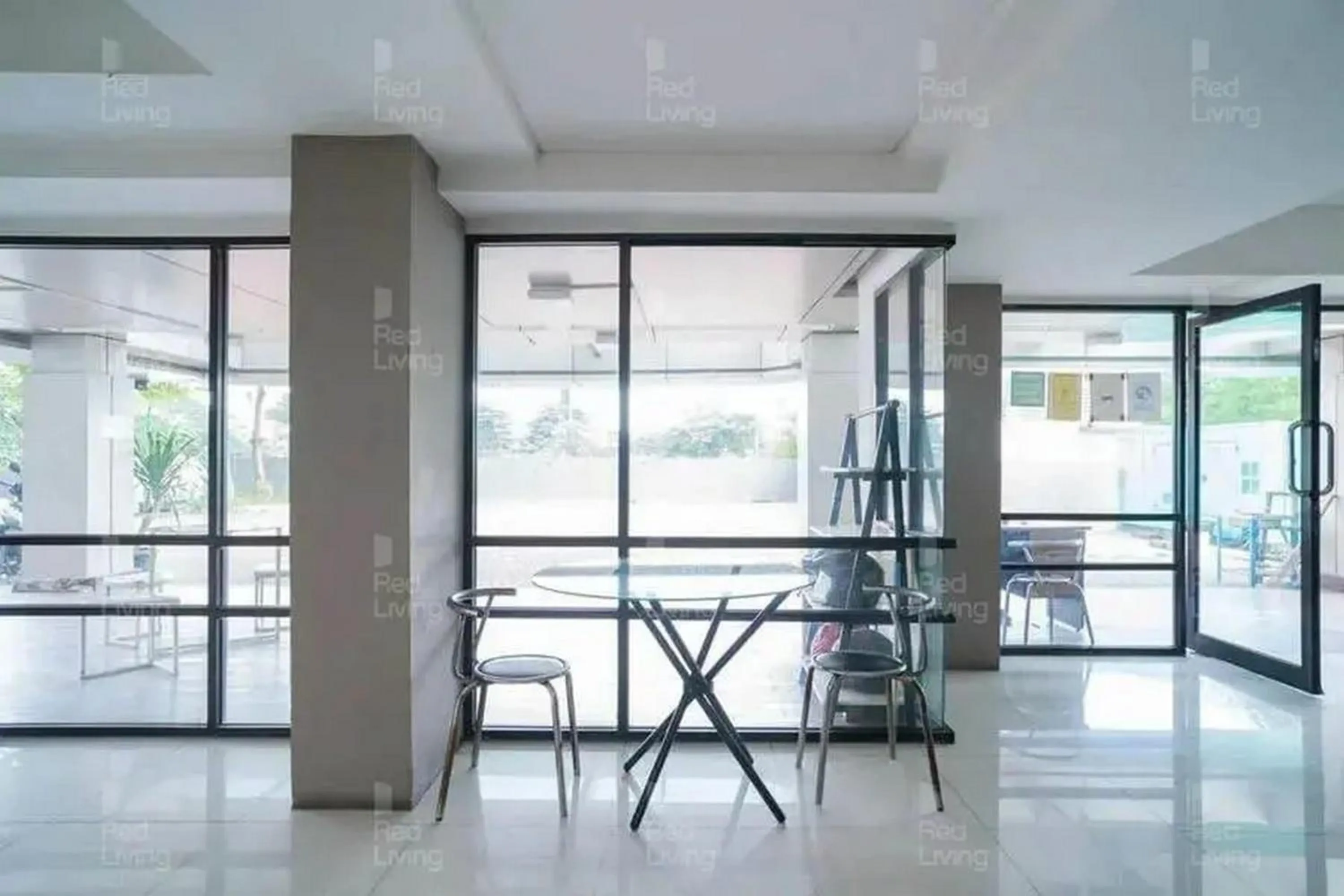 Living room in RedLiving Apartemen 19 Avenue - Amanah Room