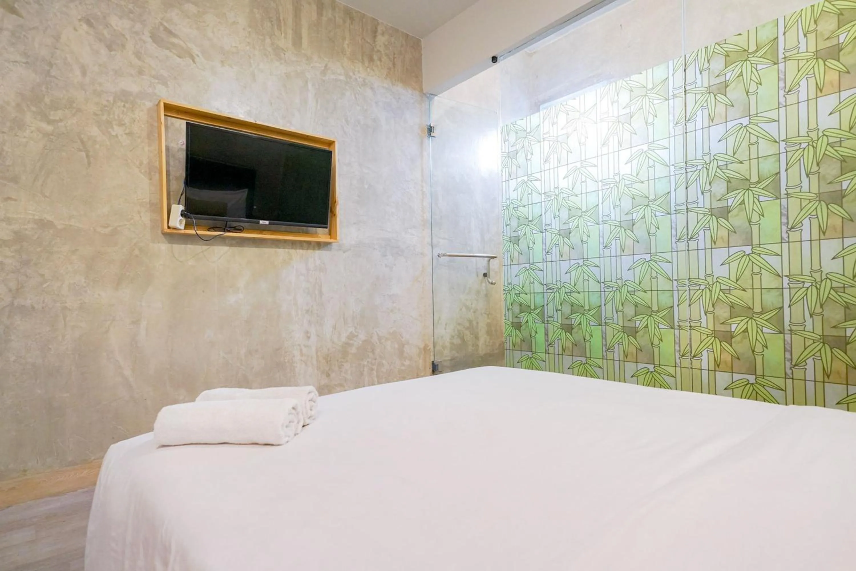 Bedroom, Bed in Urbanview Hotel Syariah De Umbrella Ciputat