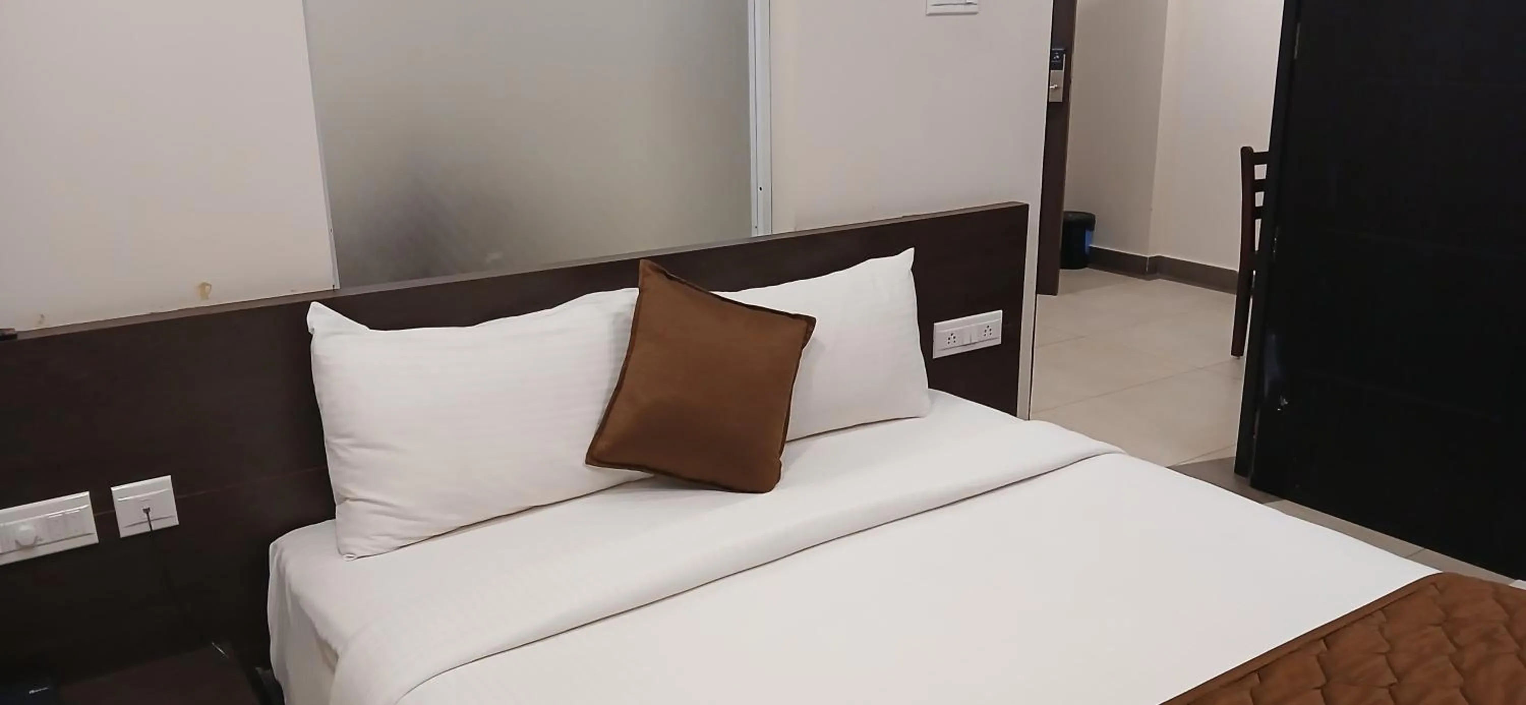 Bed in HOTEL PANKAJ RESIDENCY