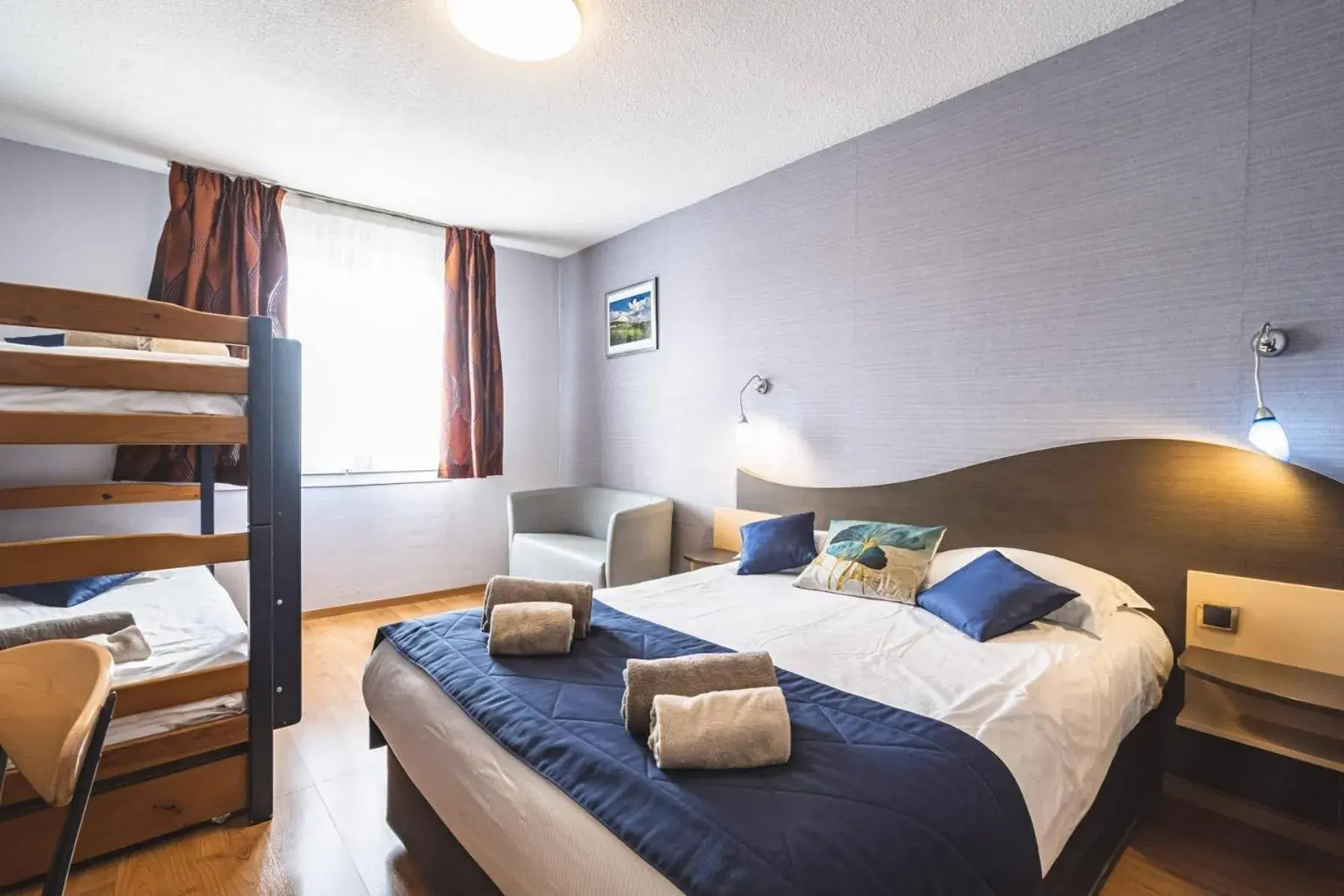 Quadruple Room in Logis Hotel au tambour Quadruple Room in Logis Hotel au tambour