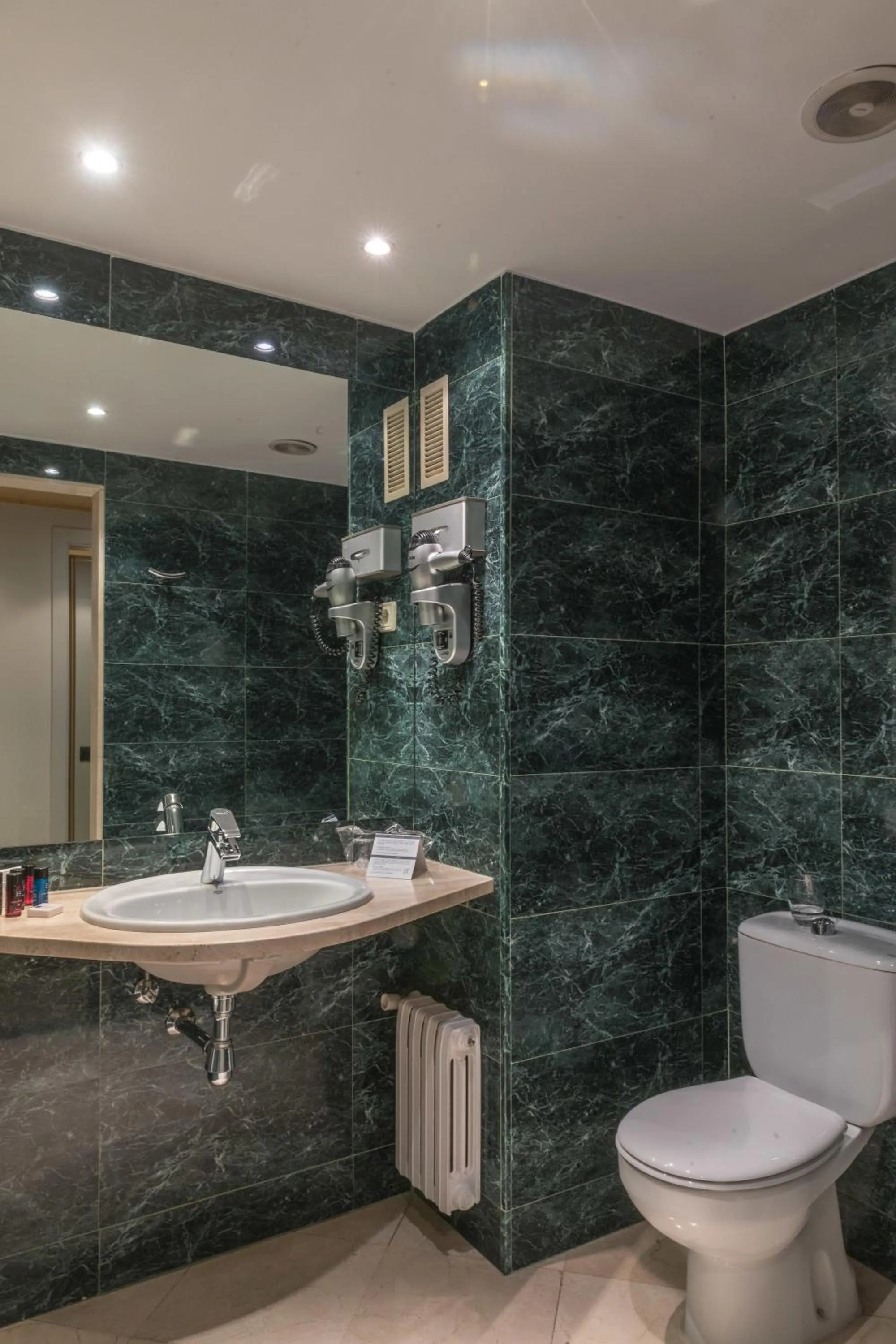 Bathroom in Up Rooms Vic Hotel